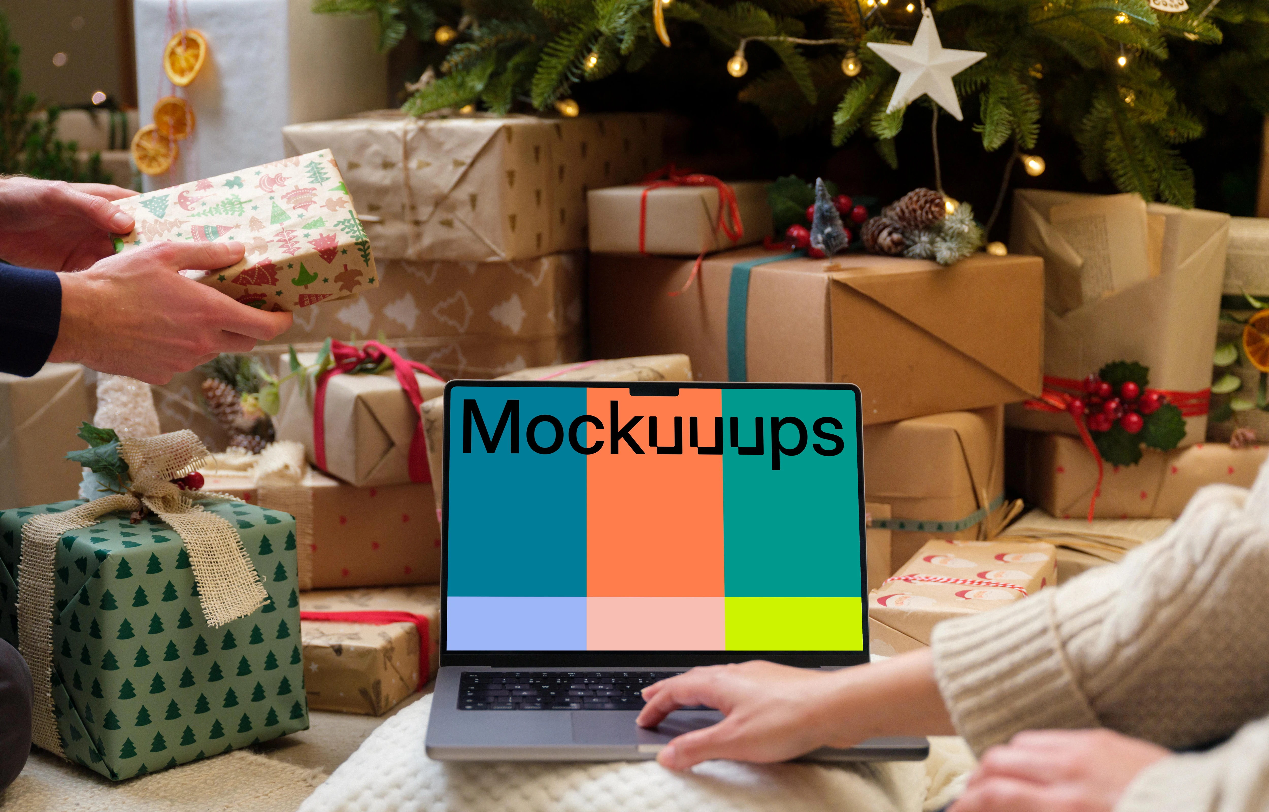 Laptop mockup surrounded by Christmas gifts