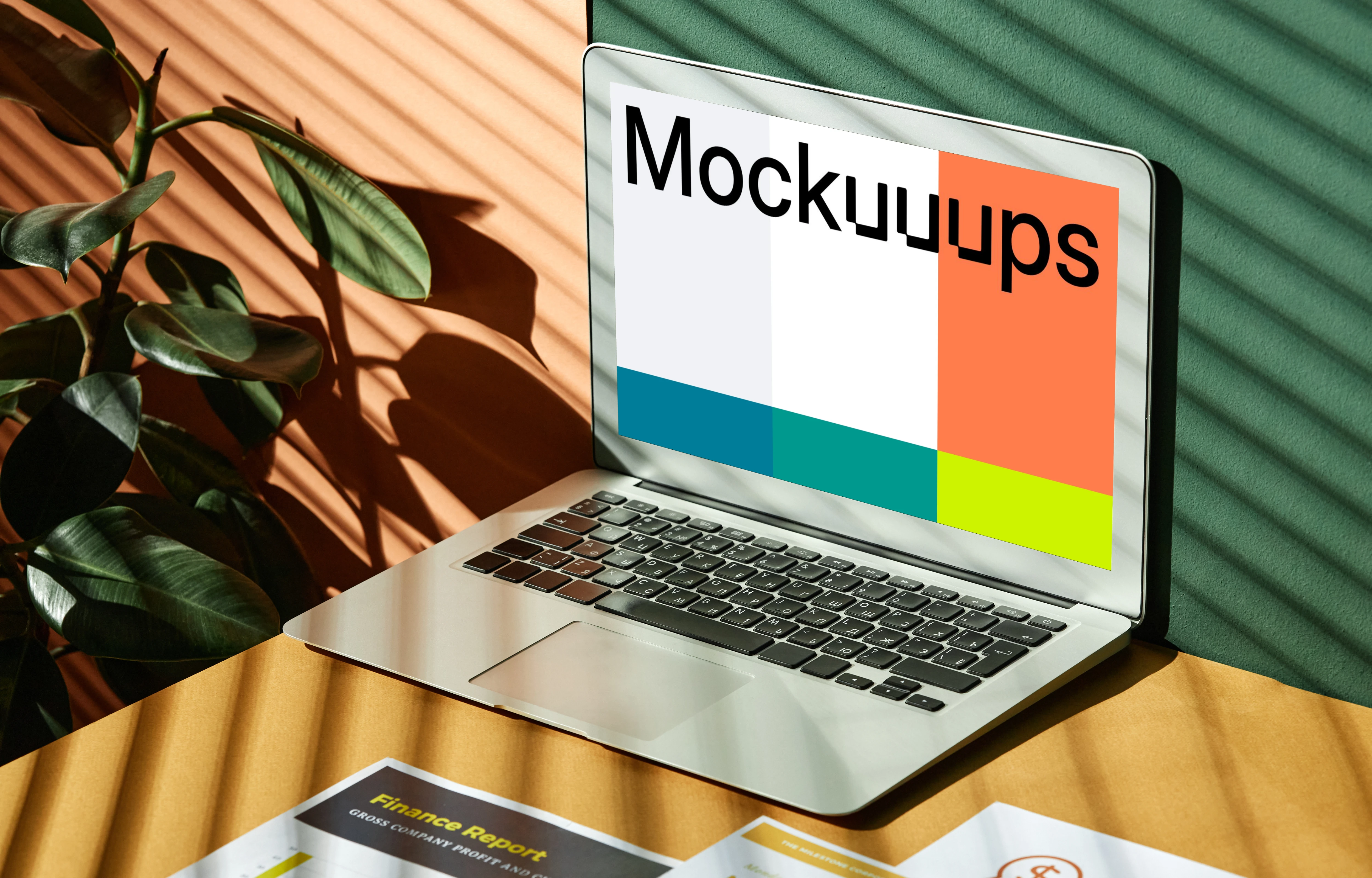 MacBook Air mockup beside a plant