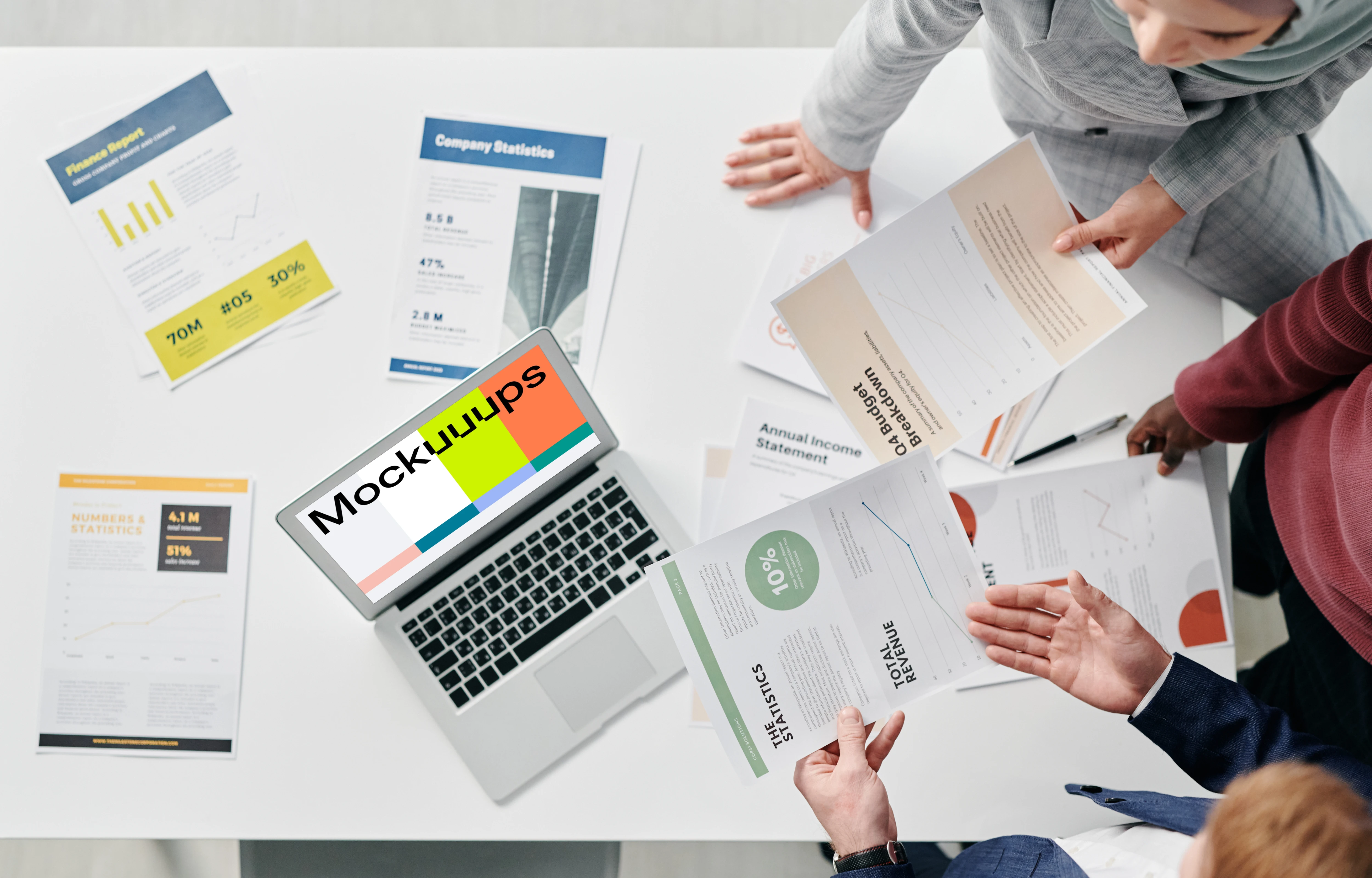 MacBook Air mockup on a table in a business meeting