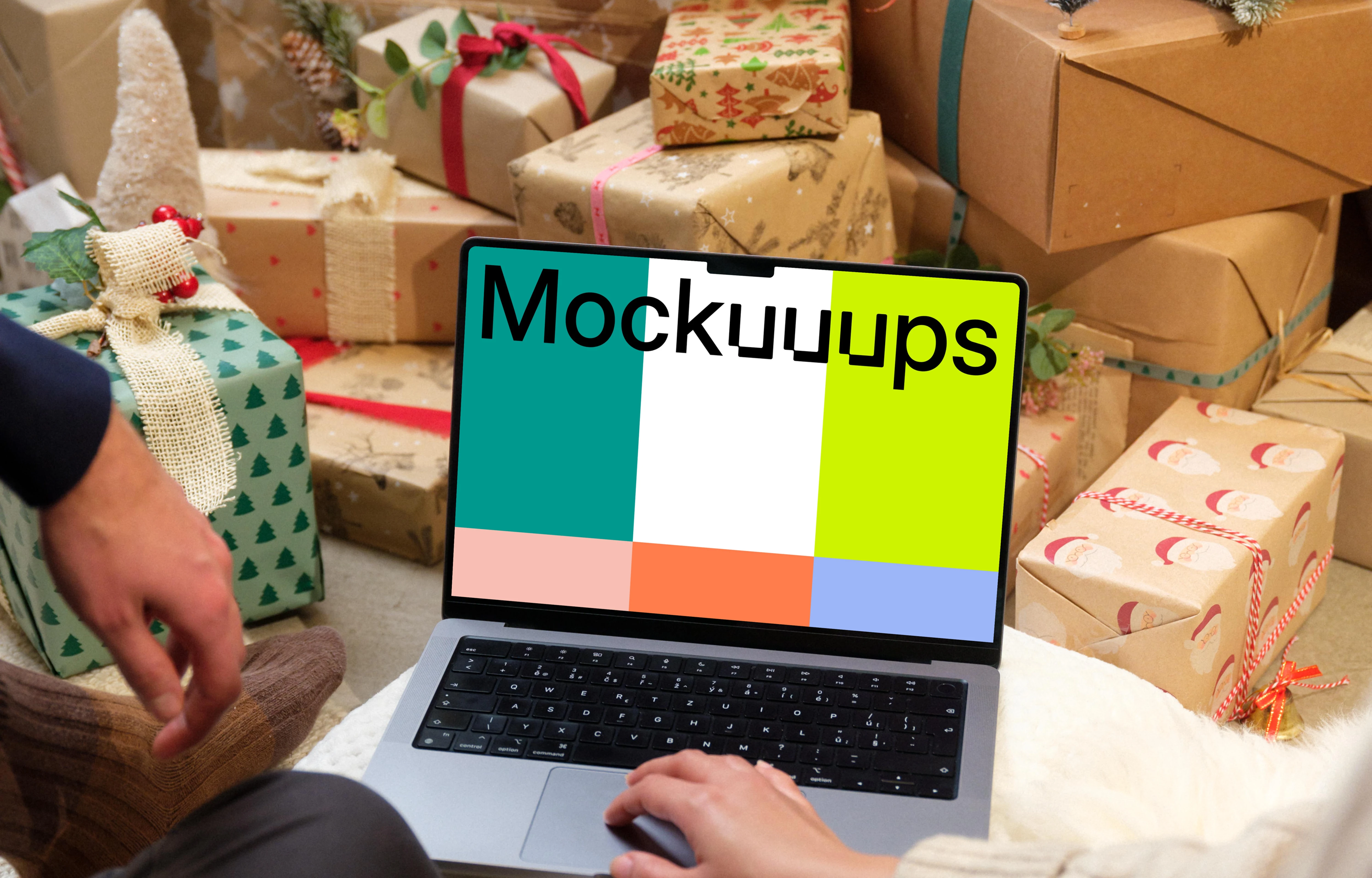 MacBook Pro 14 mockup surrounded by Christmas gifts