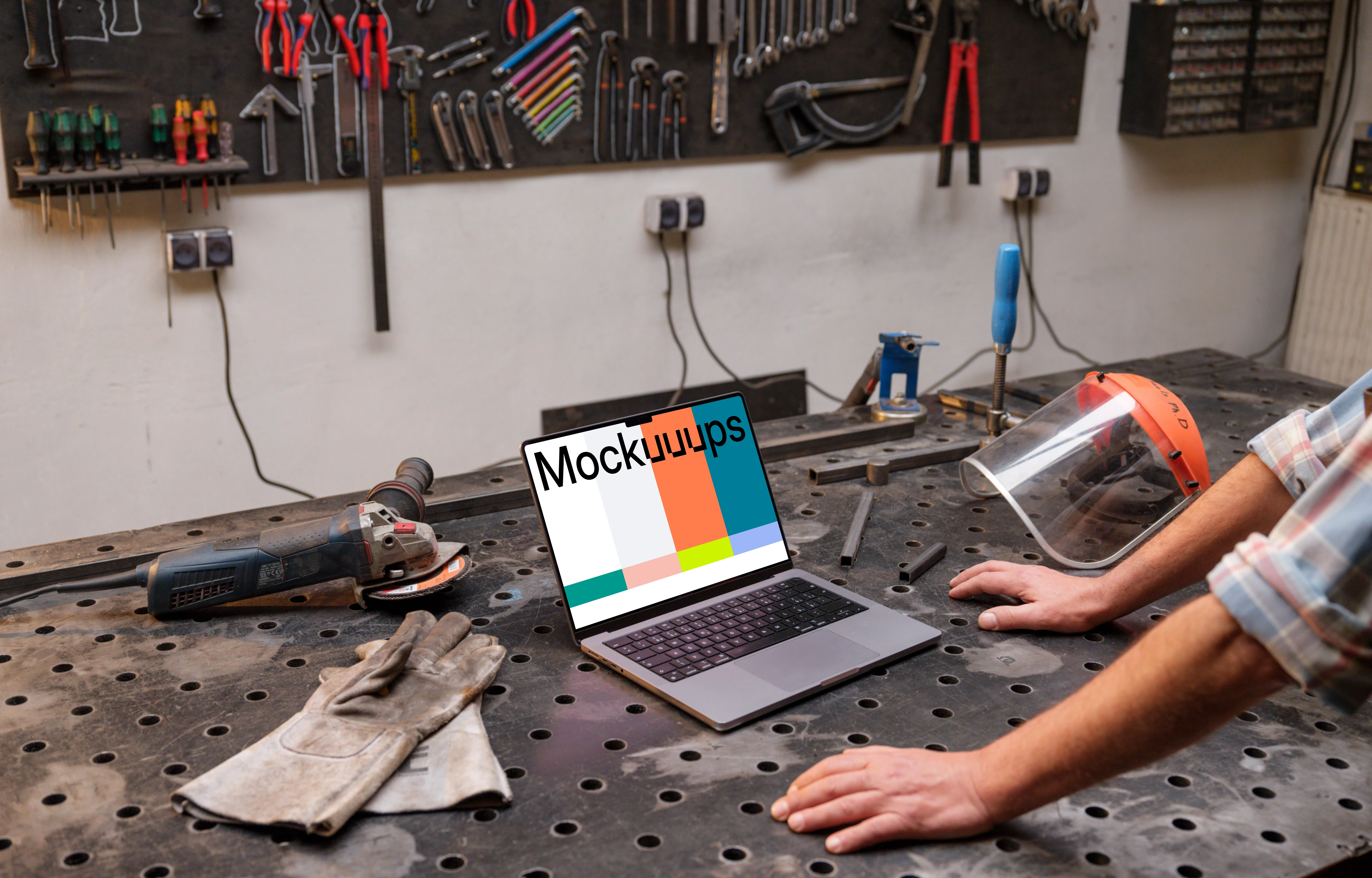 MacBook Pro mockup in workshop