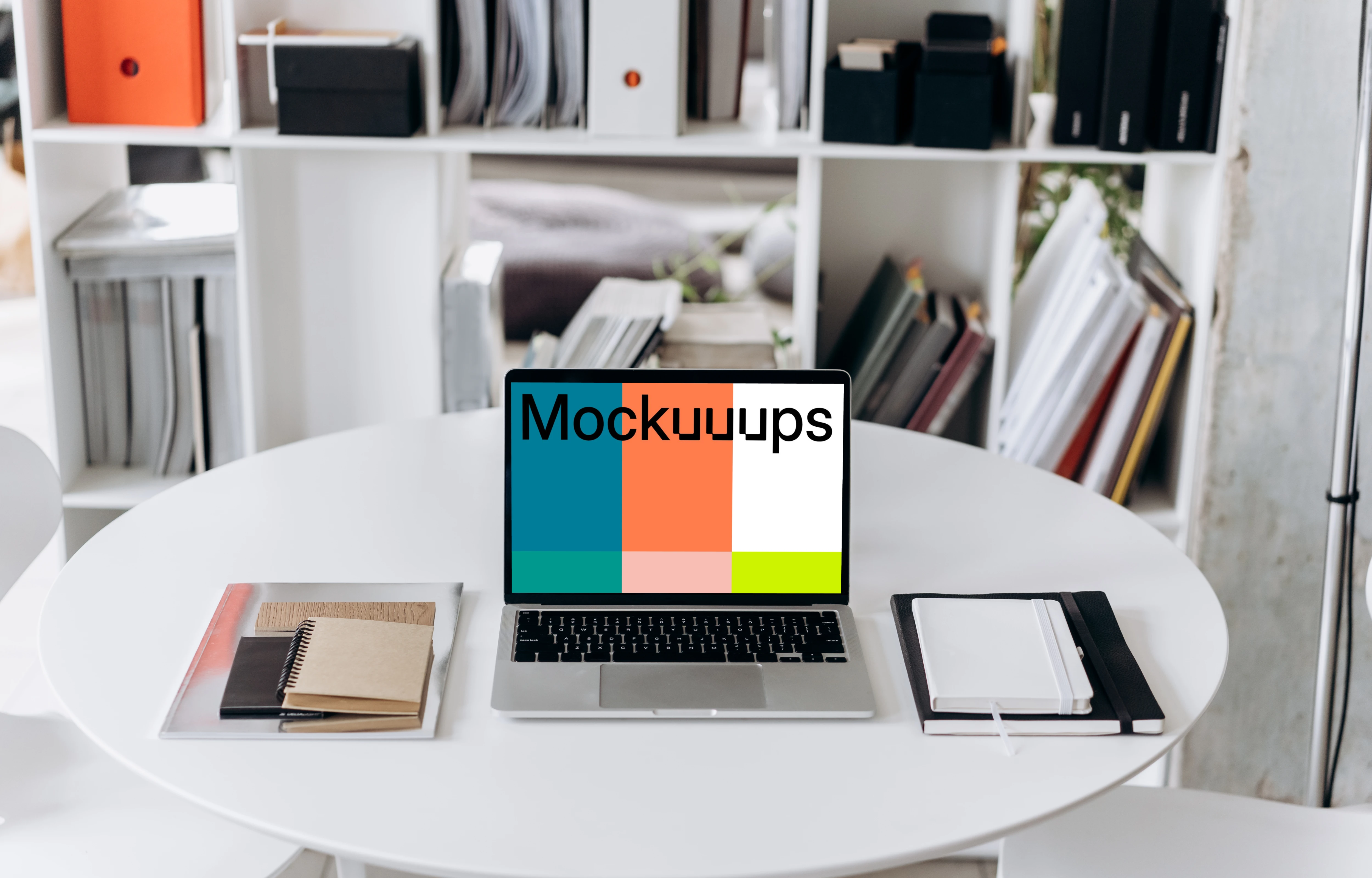 MacBook Pro mockup on a white round table