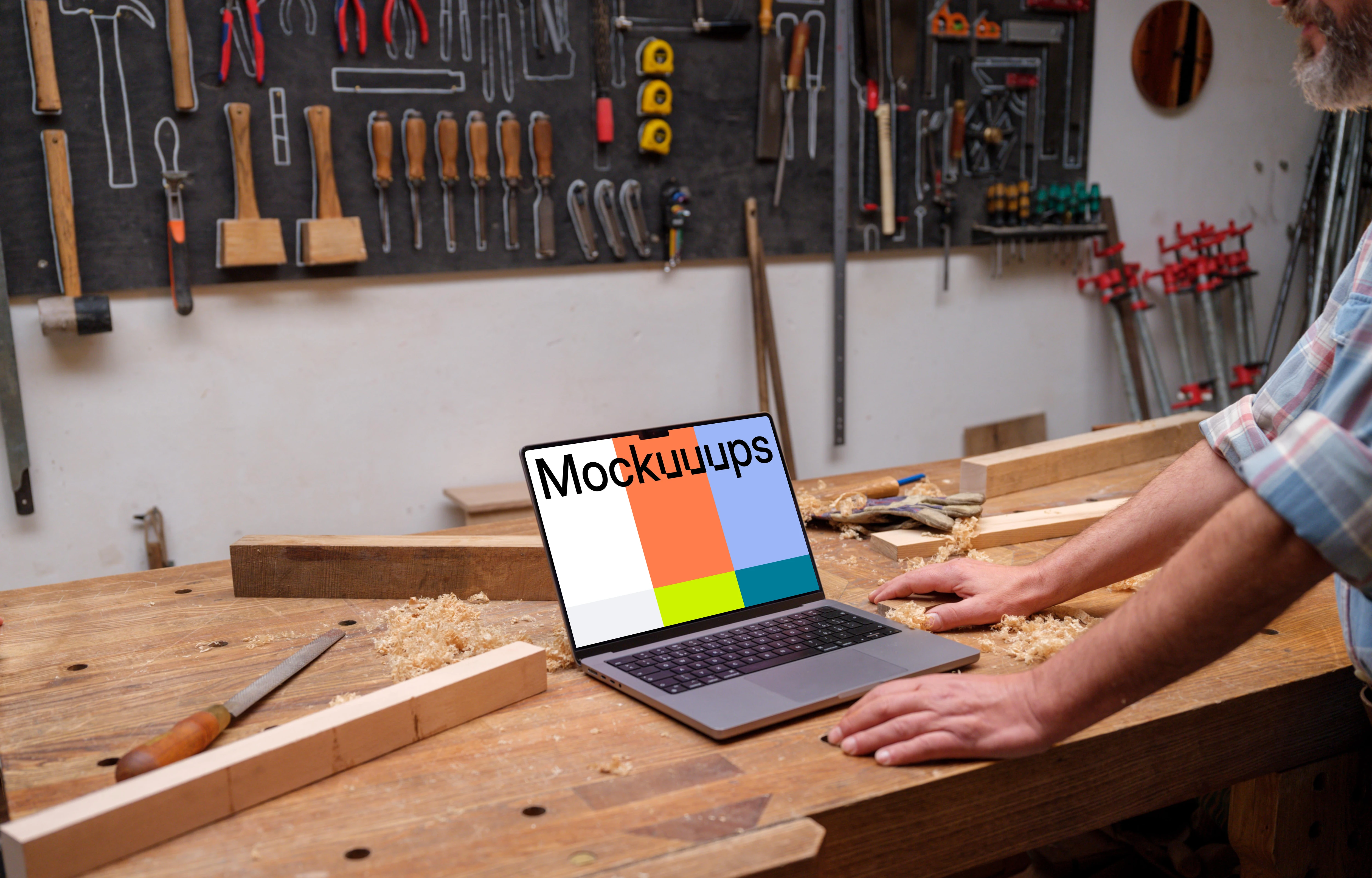 MacBook Pro mockup on a wooden desk