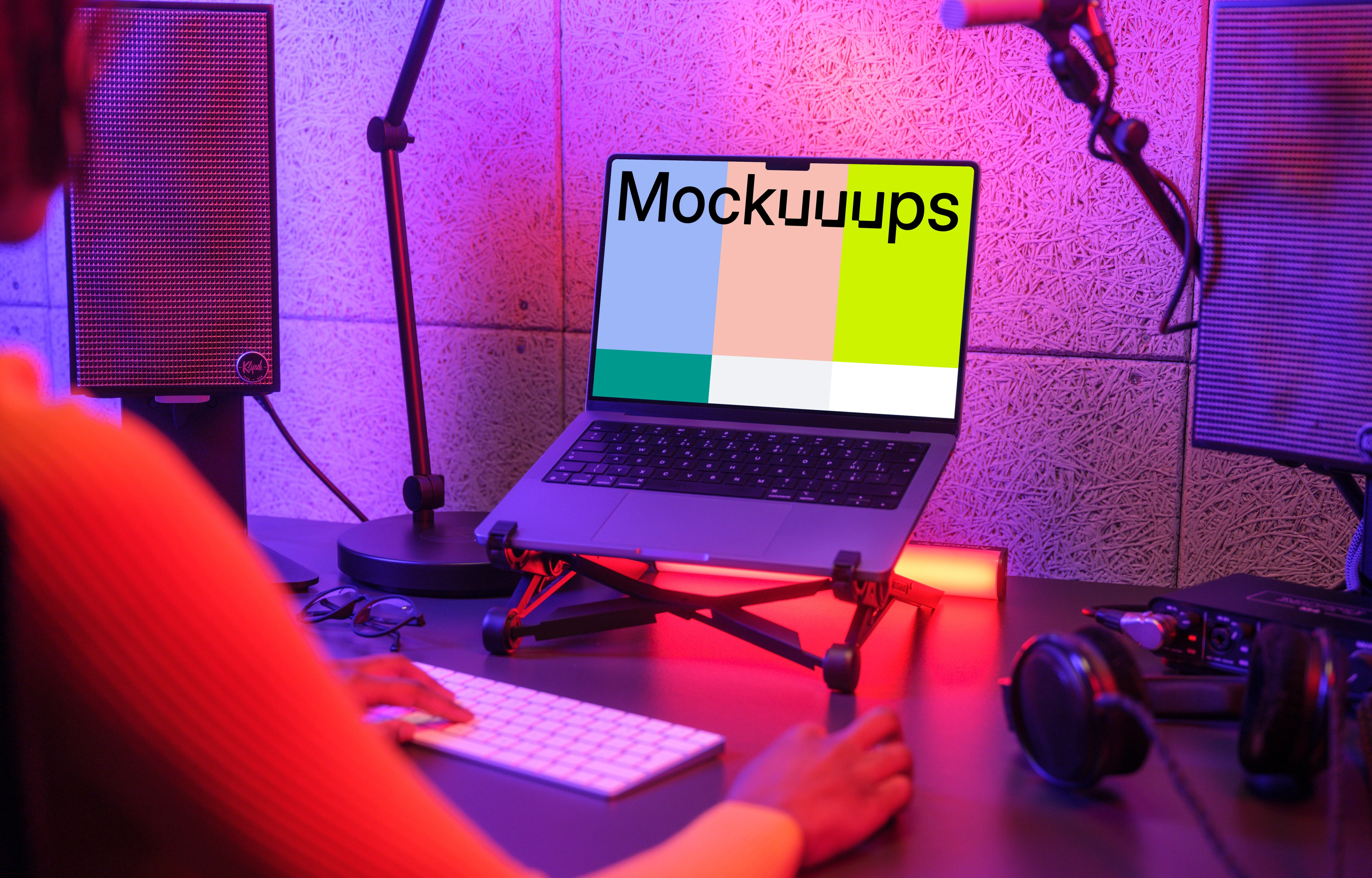 MacBook Pro mockup with a vibrant gaming setup