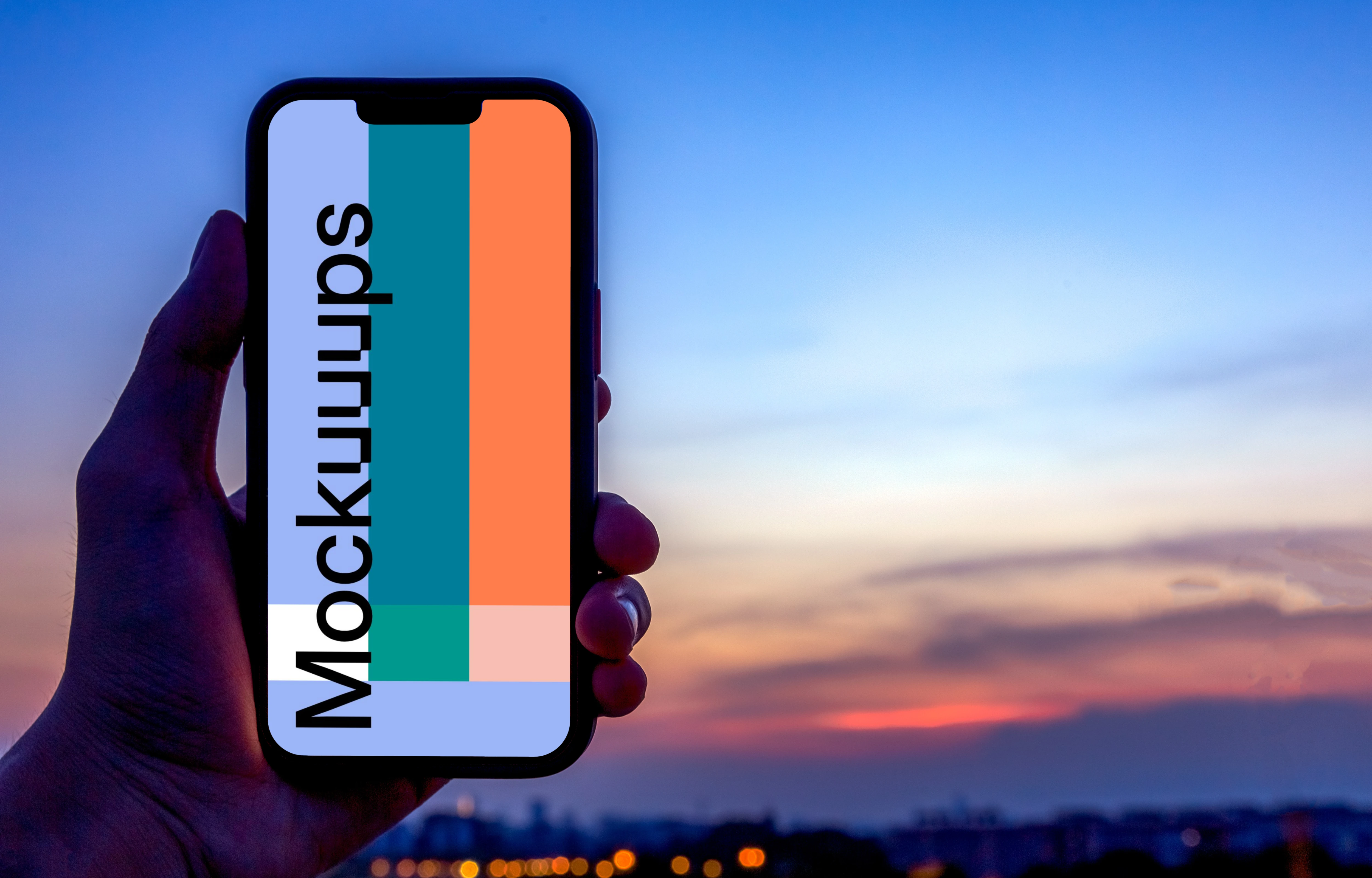 Male hand holding an iPhone 13 mockup