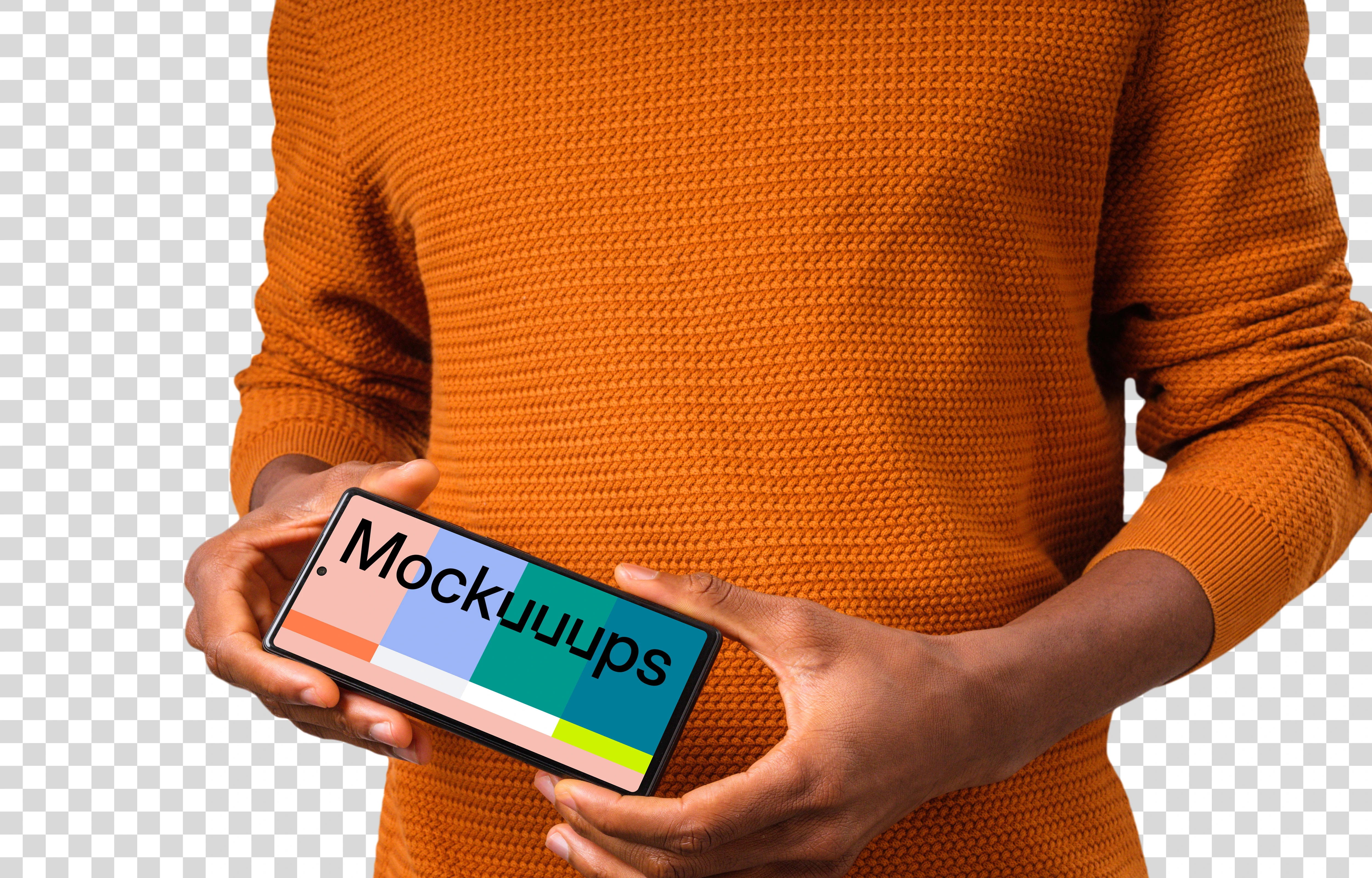 Man in orange sweater holding Google Pixel mockup in landscape