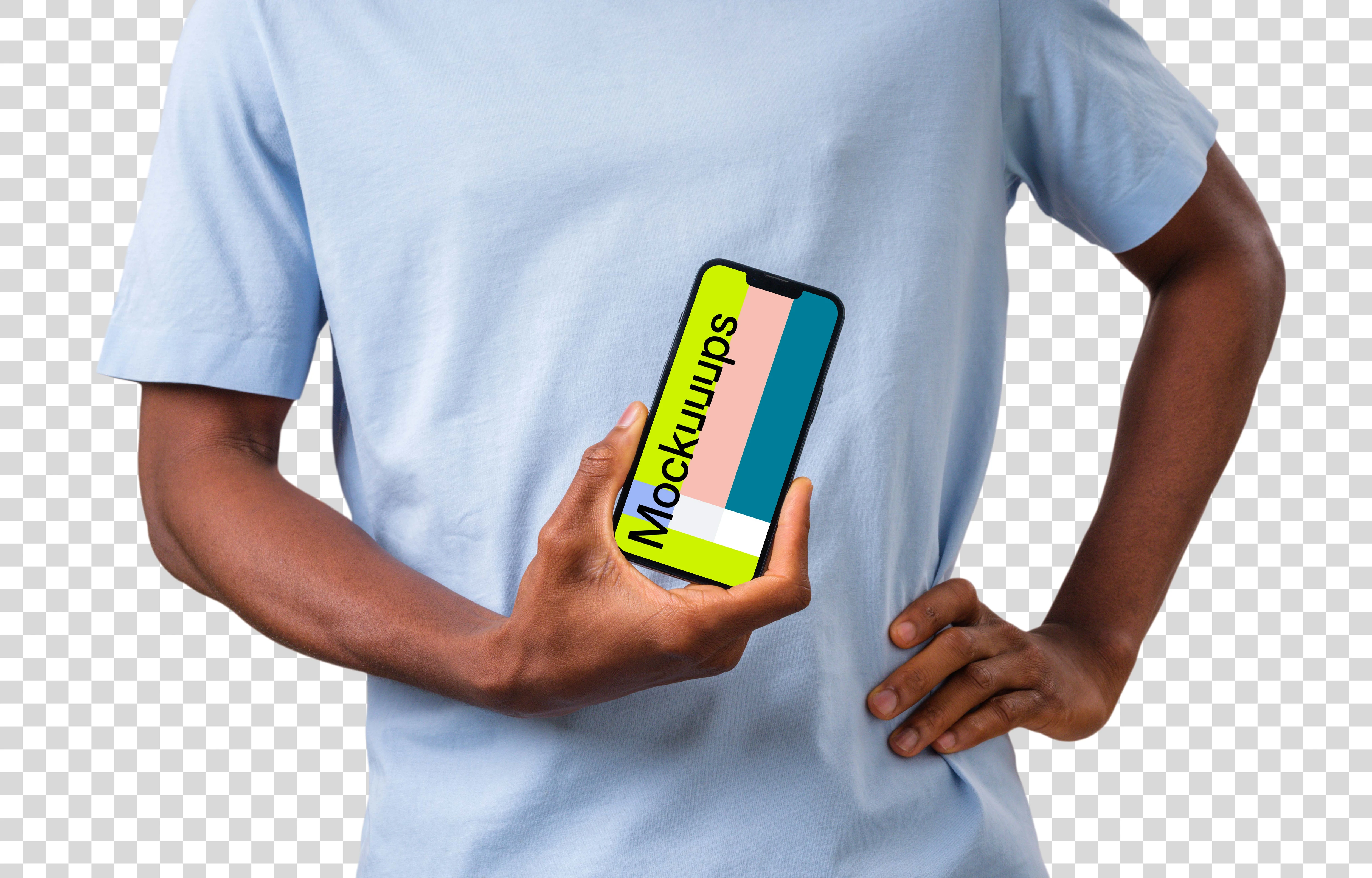 Man standing and holding iPhone mockup
