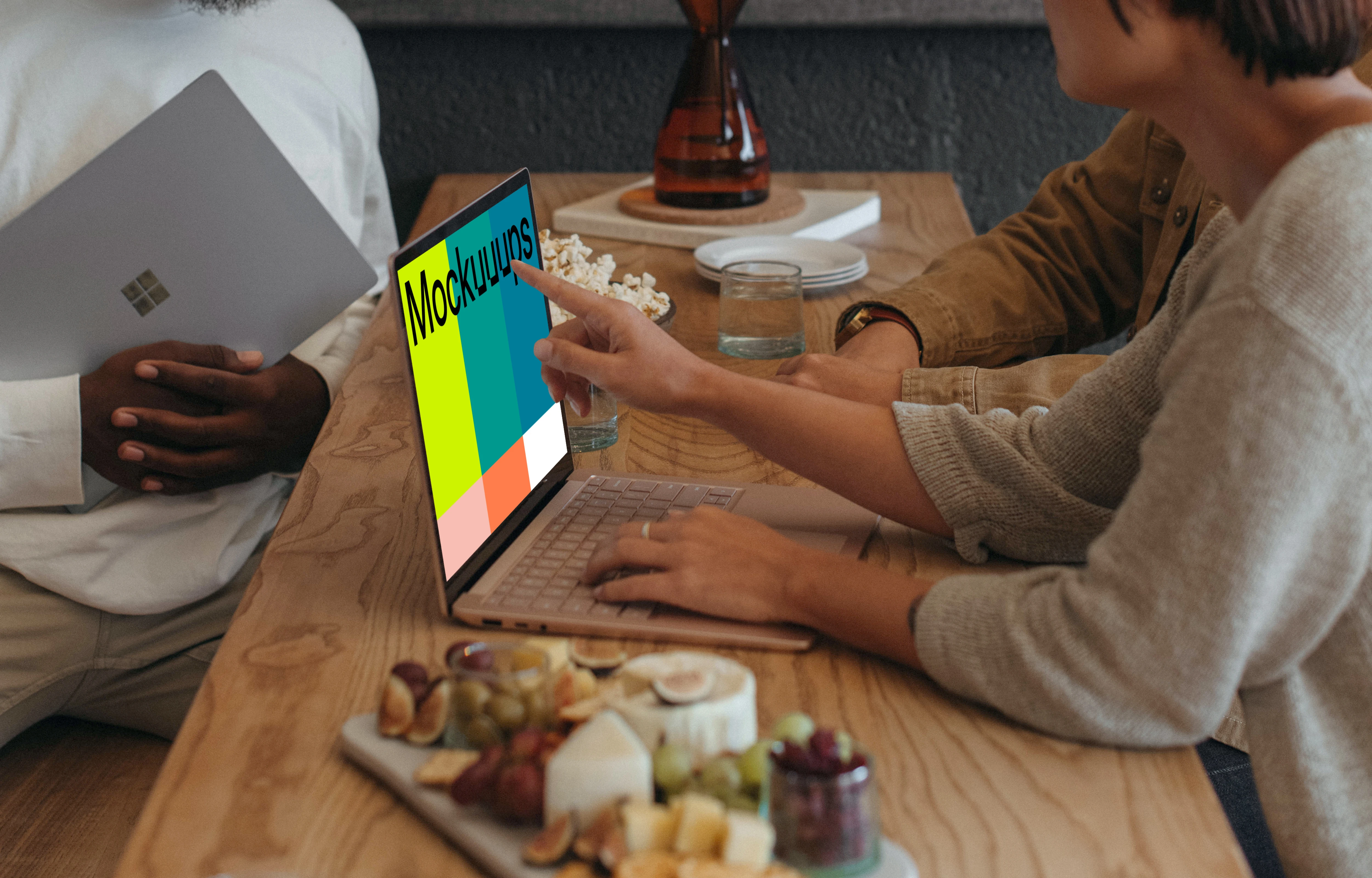 Microsoft Surface laptop mockup with multiple users