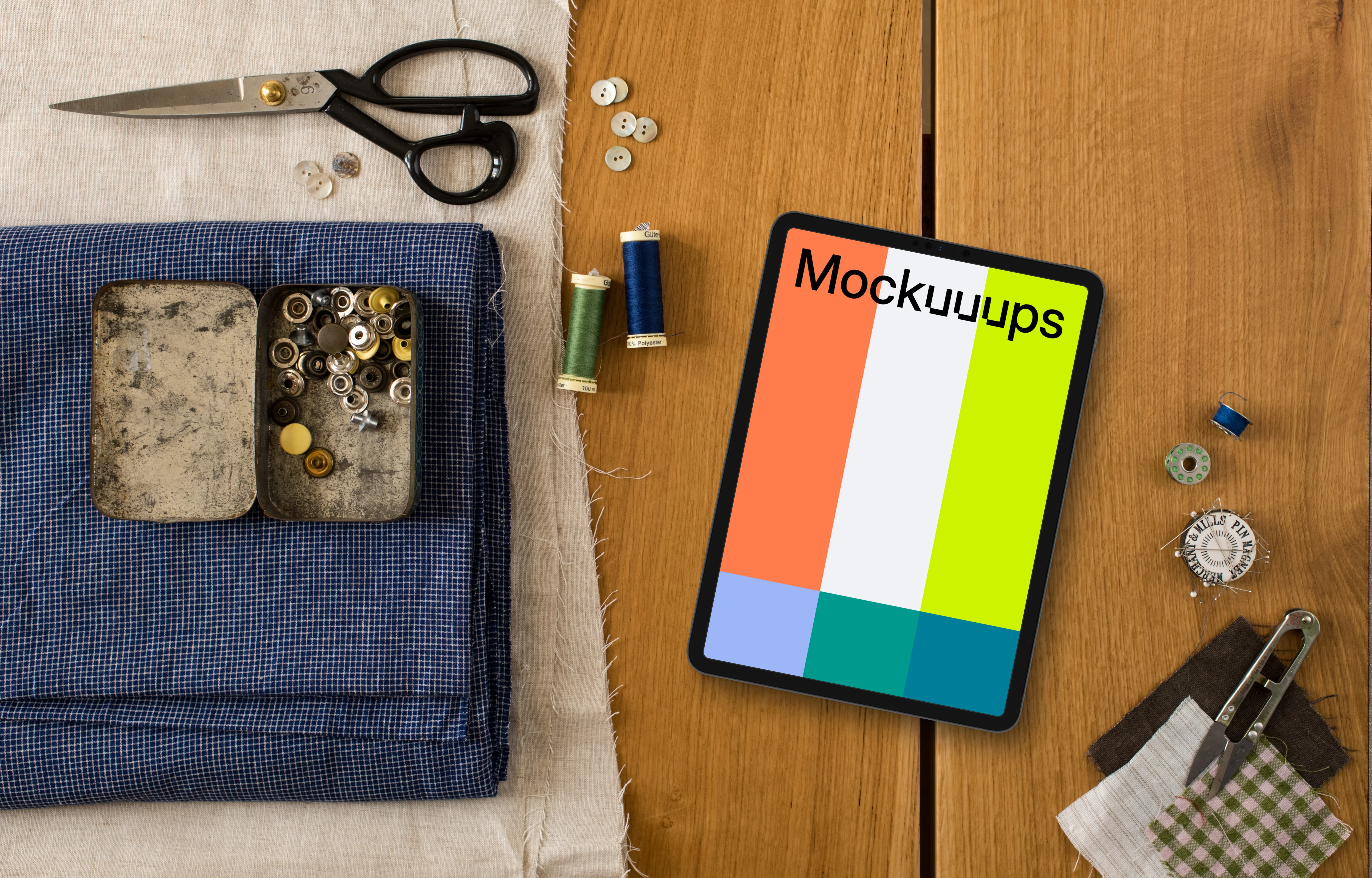 Mockup of tablet with sewing accessories