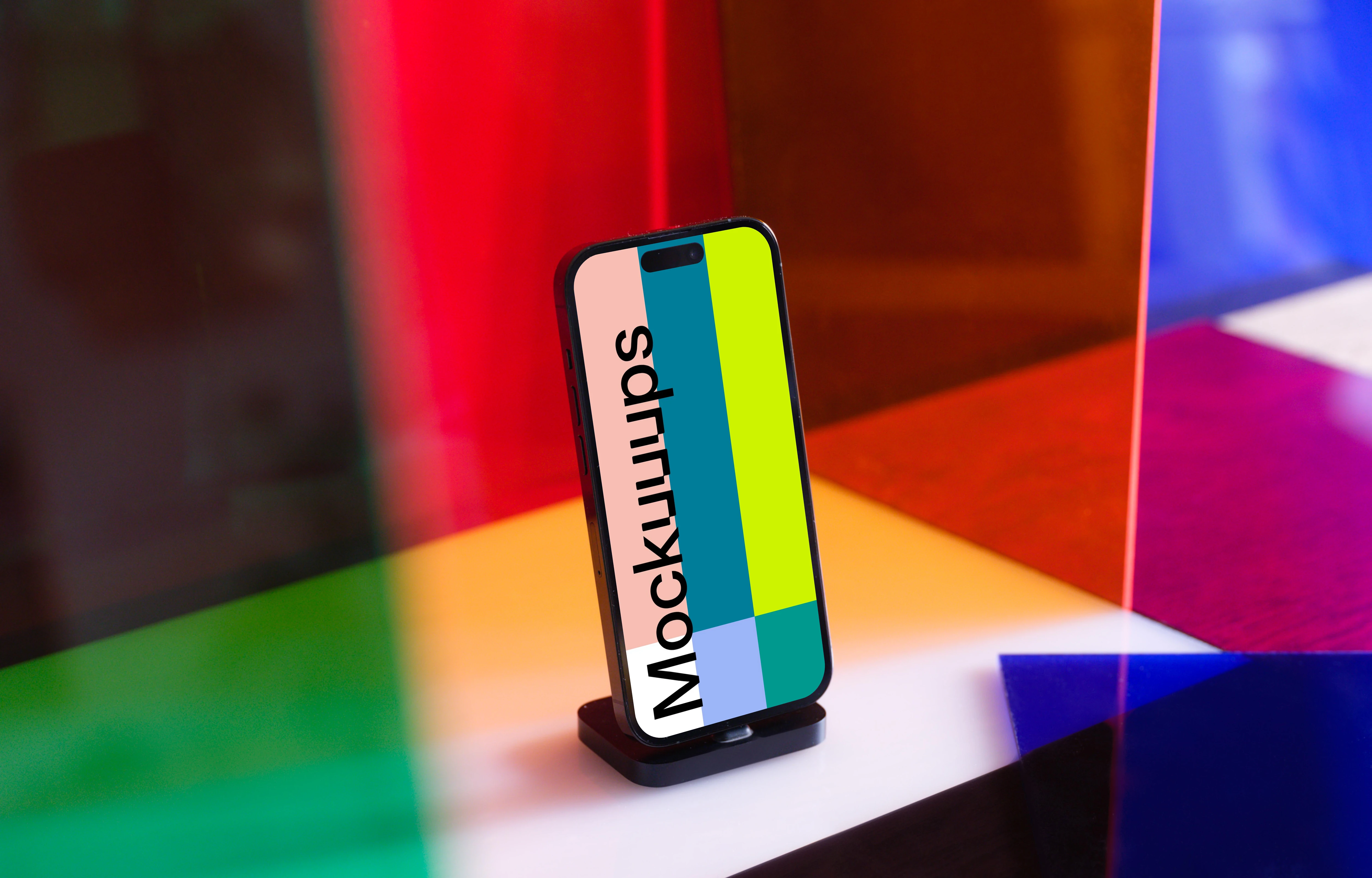 Multicolored background behind a iPhone 14 Pro mockup