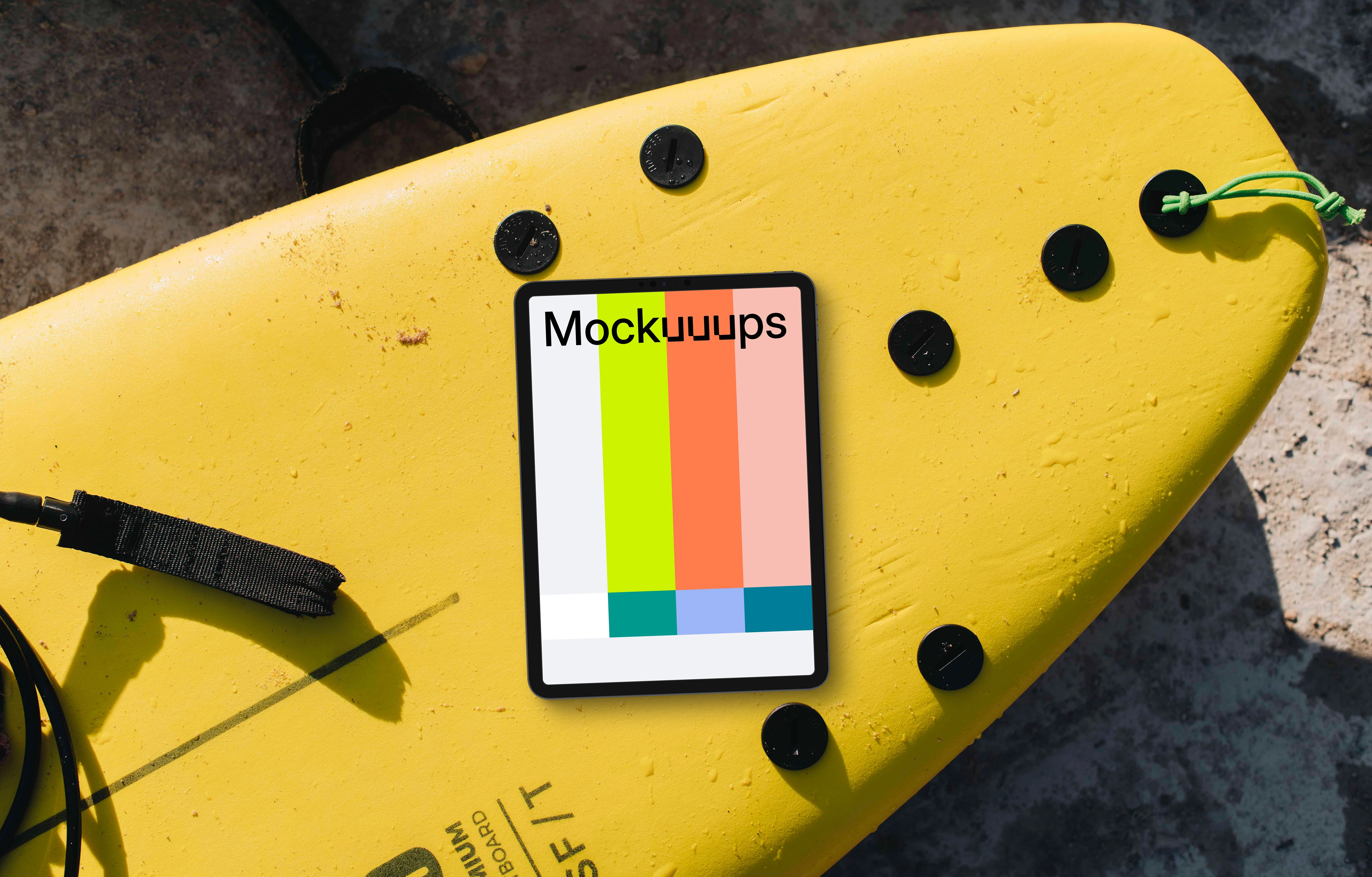 Surfboard with the tablet mockup on top of it