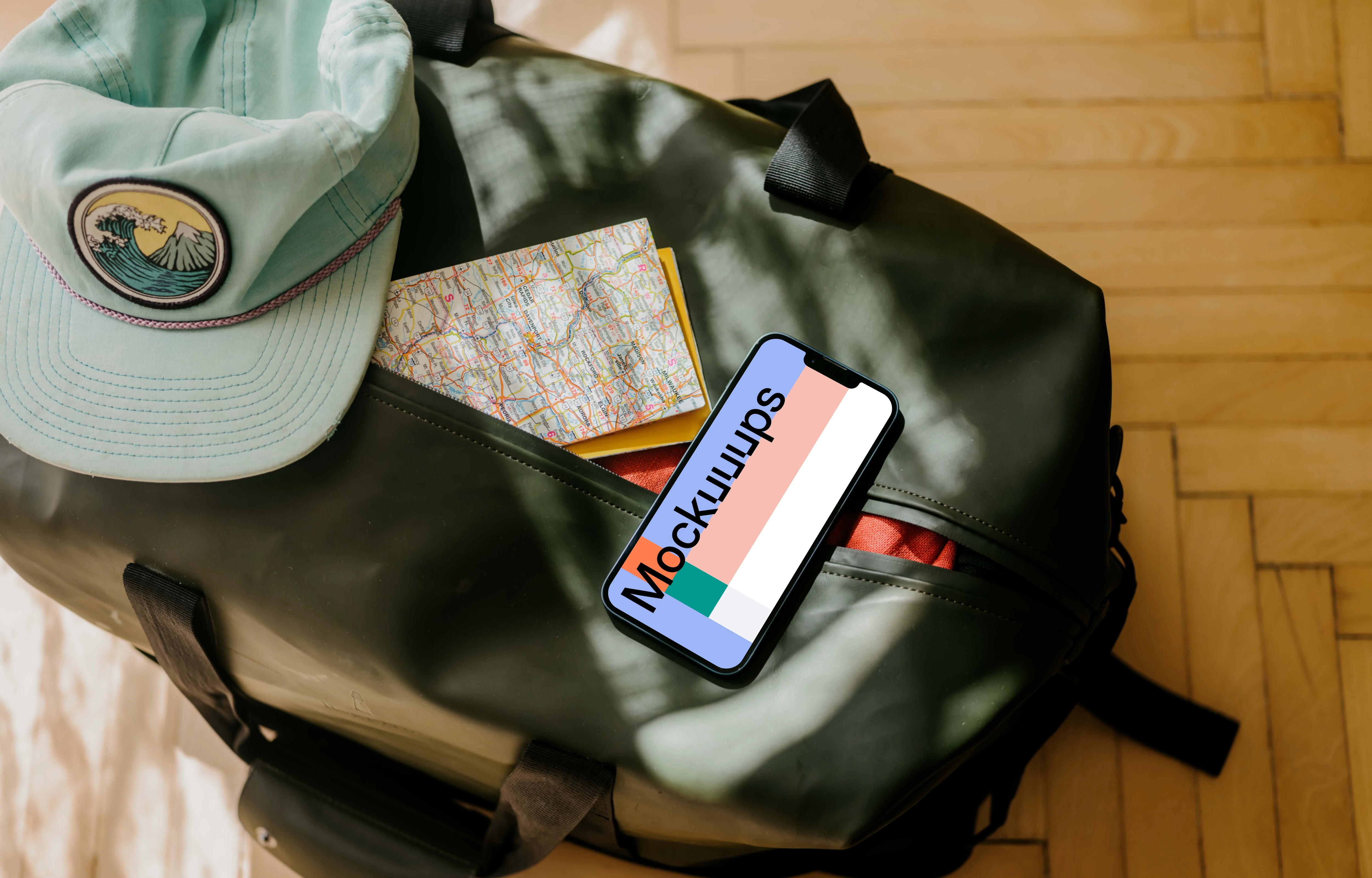 iPhone 13 mockup on travel bag mockup