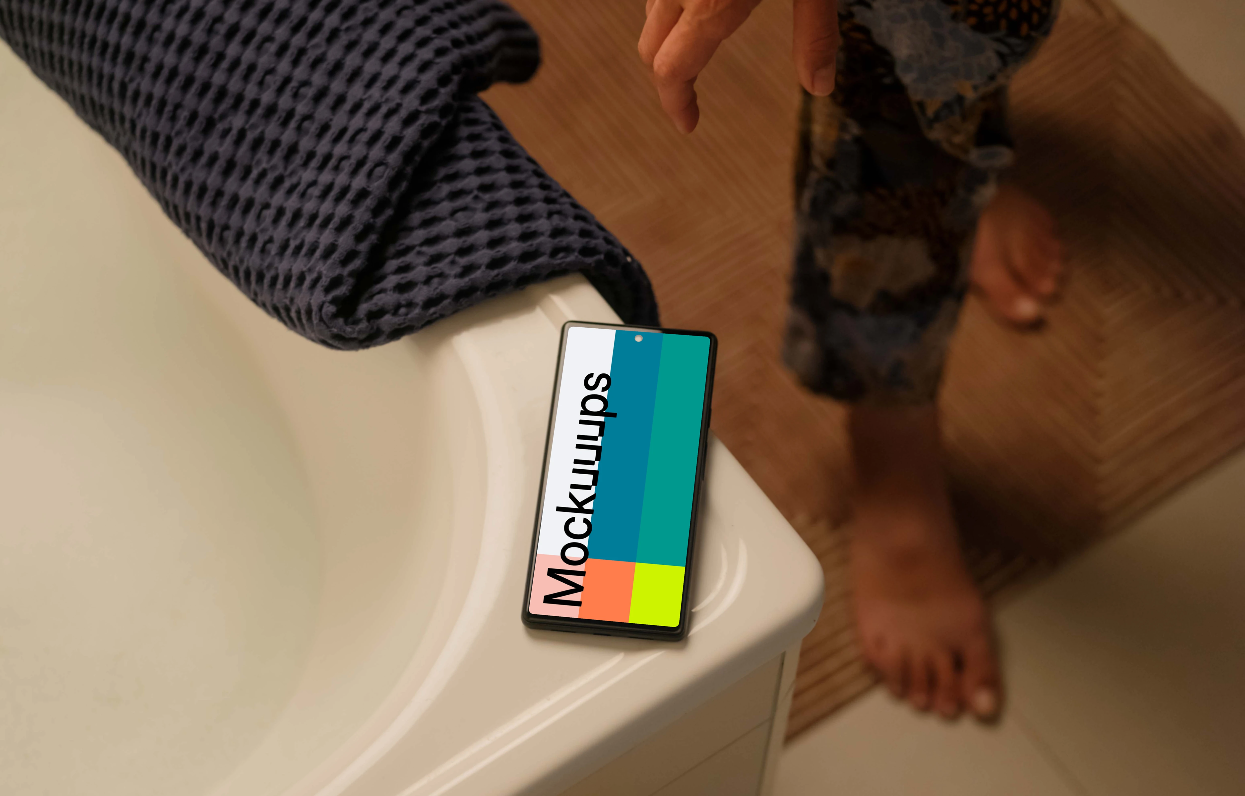 Person standing next to Google Pixel mockup