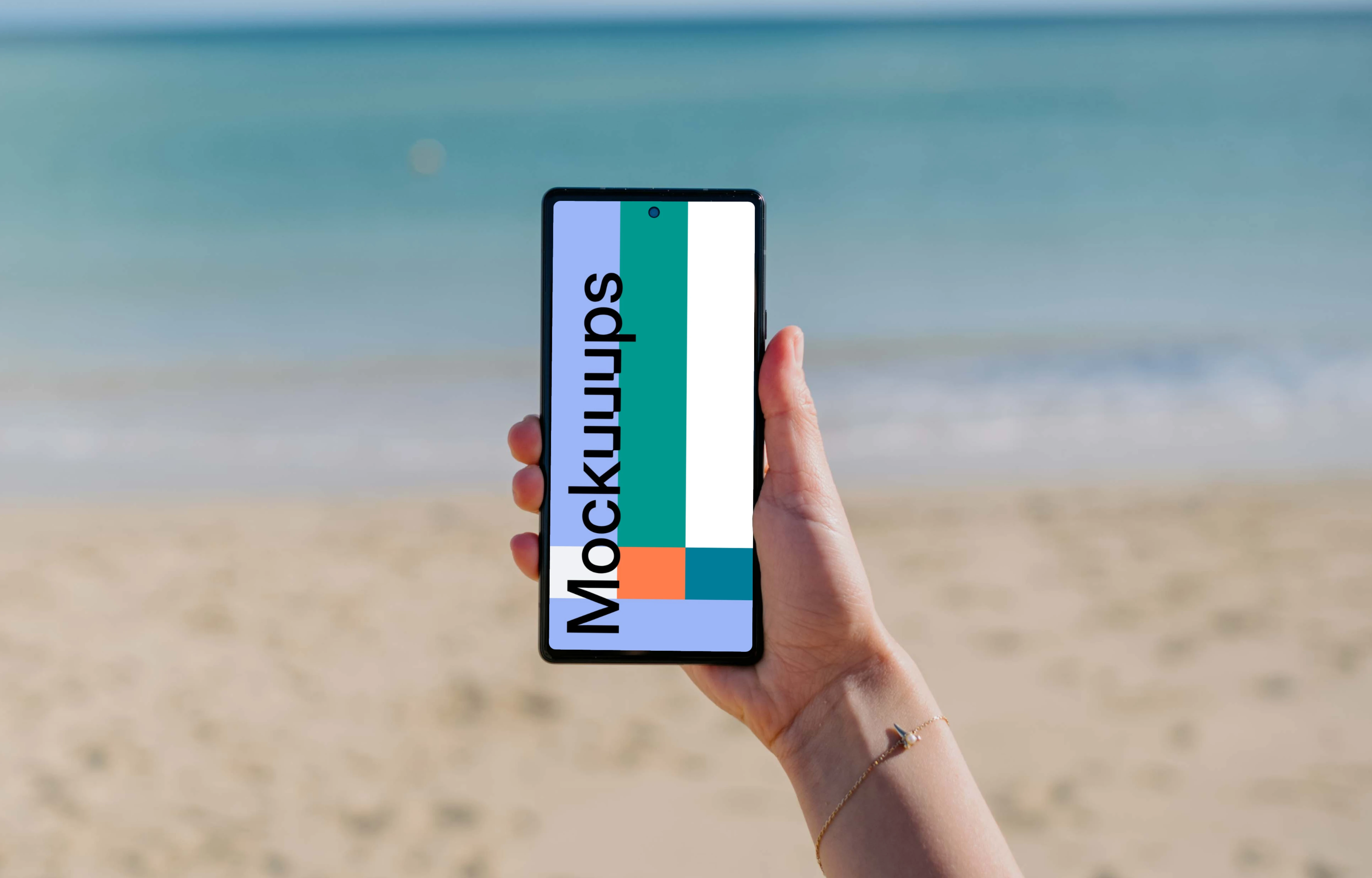 Pixel 6 mockup held by a user at the beach
