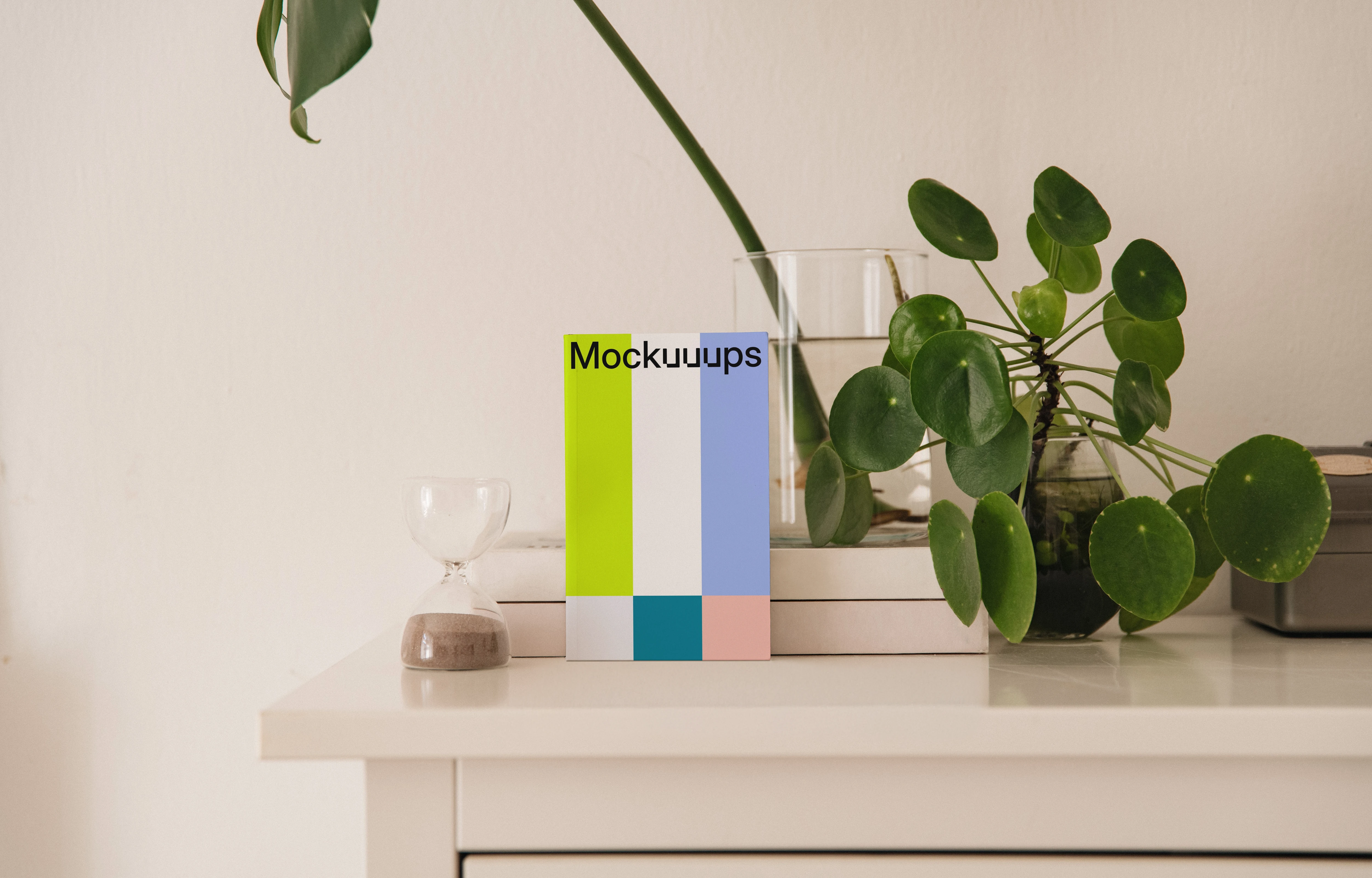Softcover book mockup on a white dresser