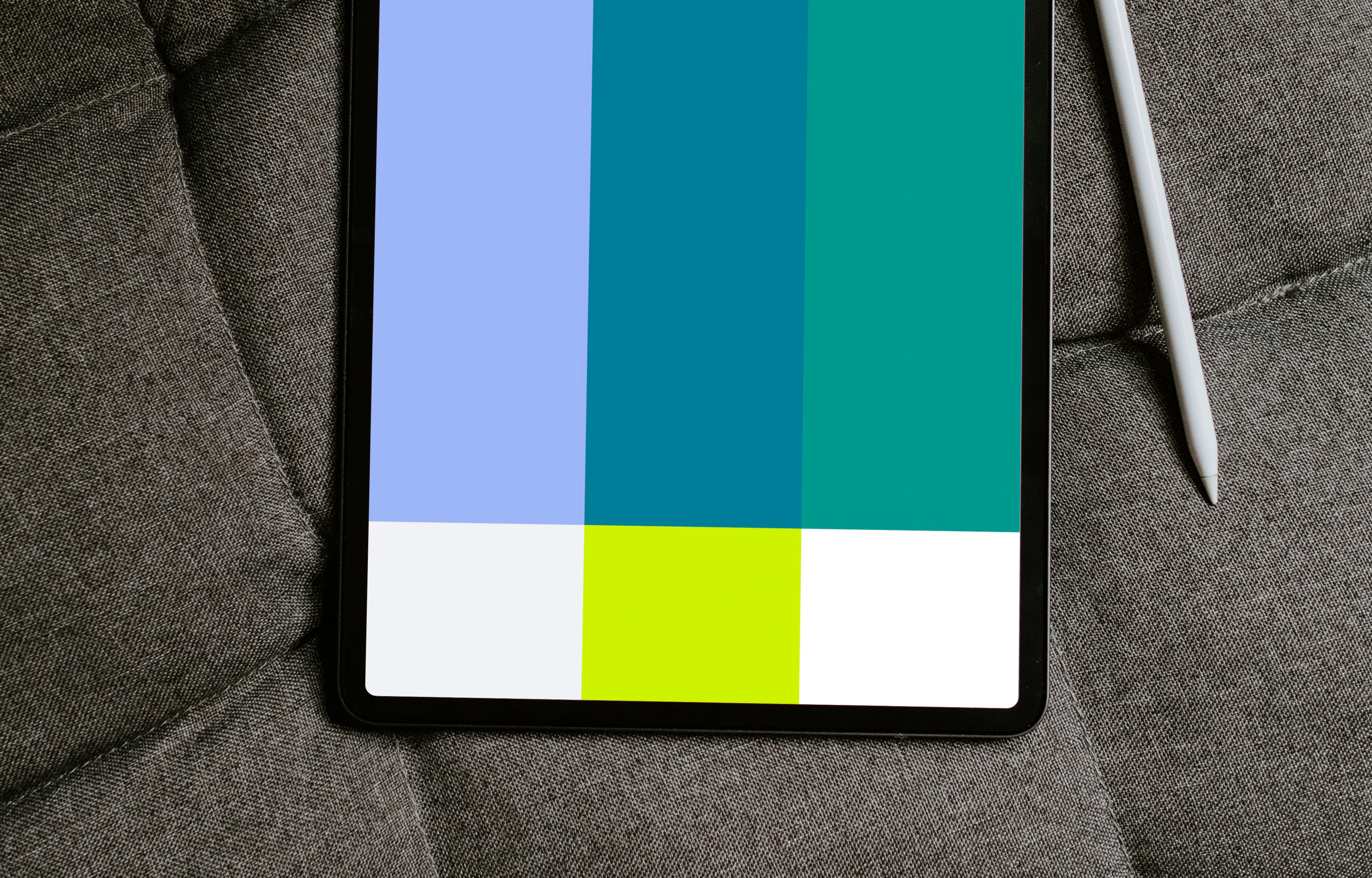 Tablet mockup on an gray sofa