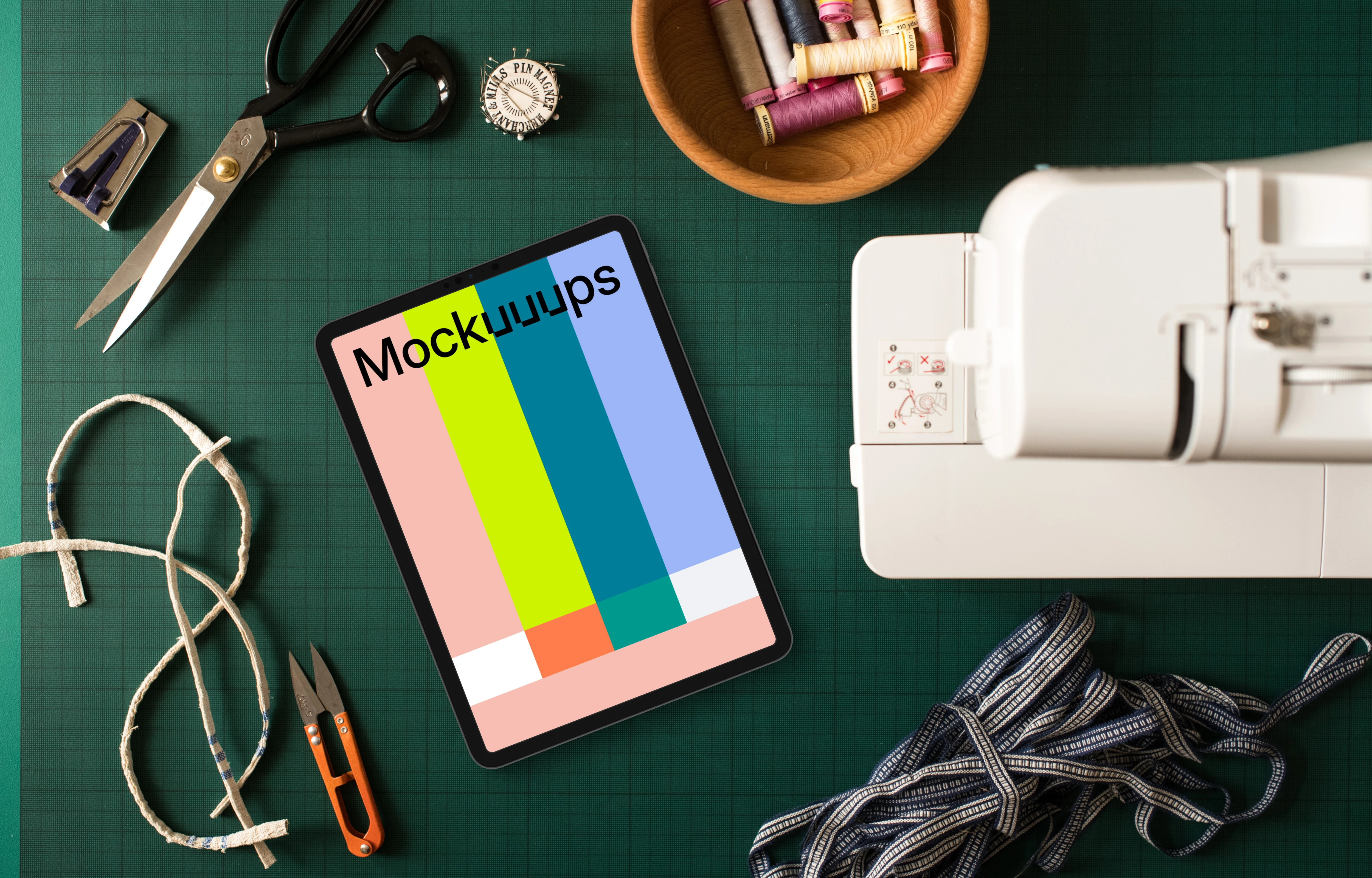 Tablet mockup on green work mat