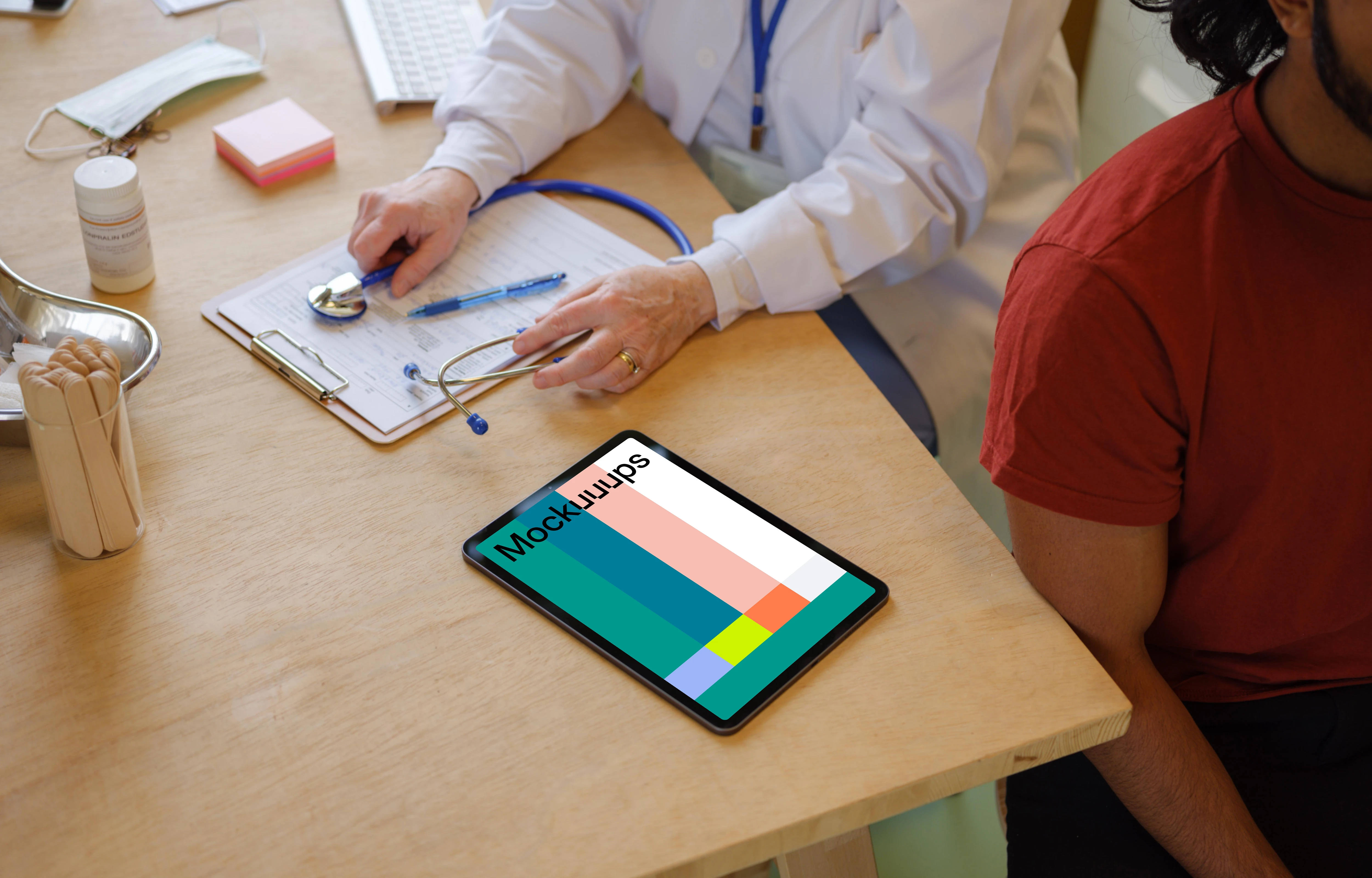 Tablet mockup placed on the doctor’s table