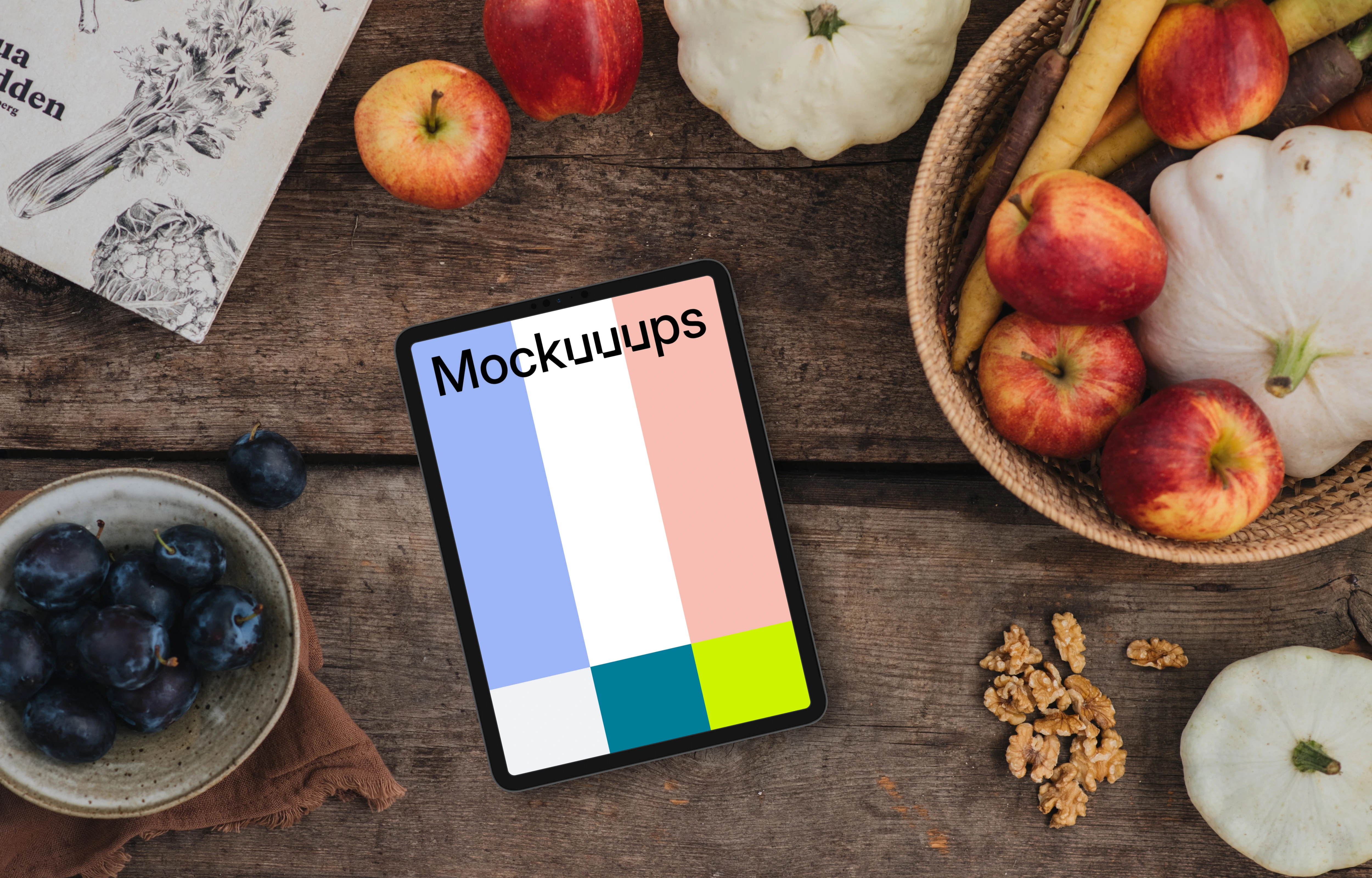 Tablet mockup surrounded by vegetables