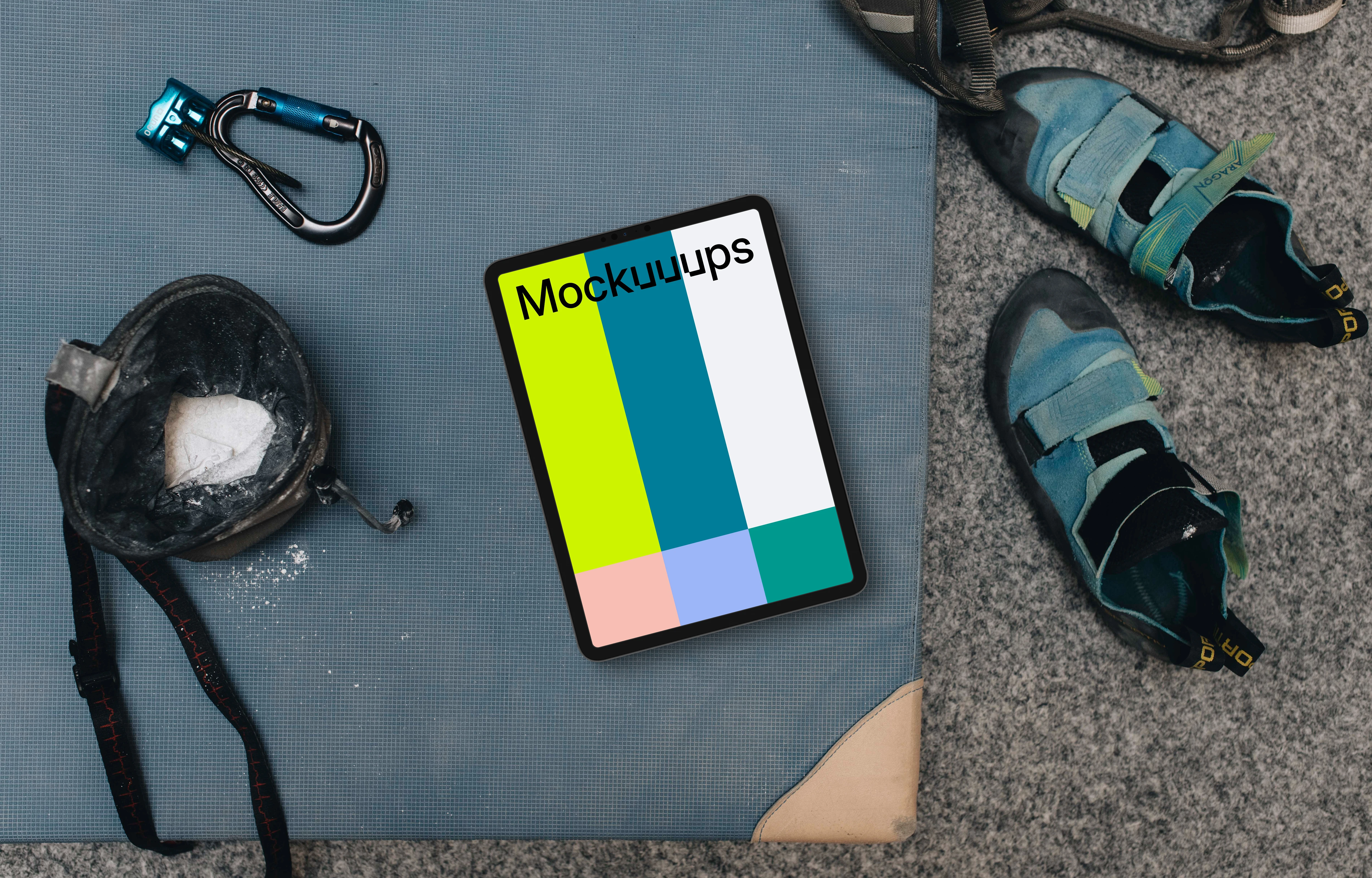 Tablet mockup with climbing equipment