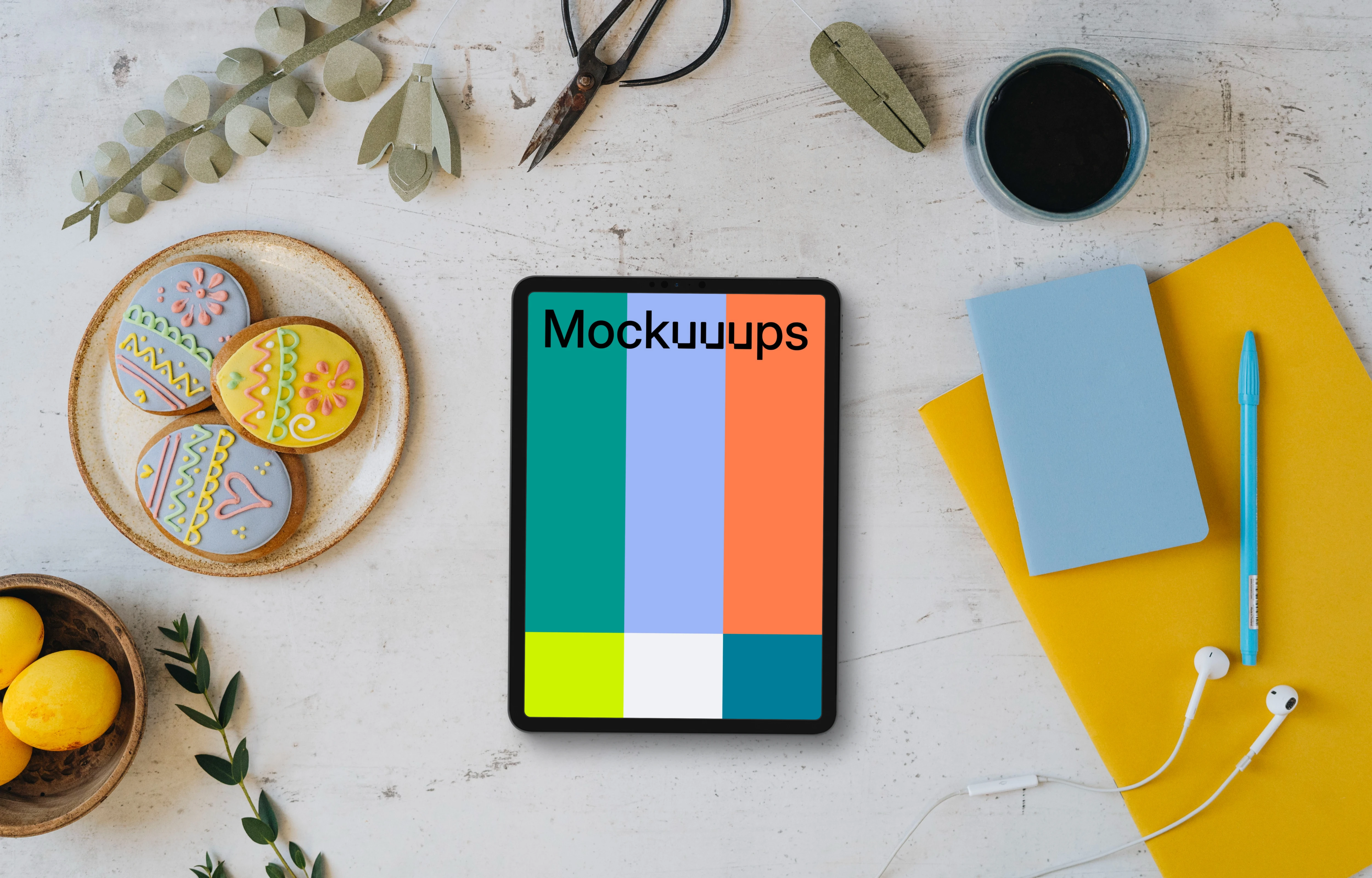 Tablet mockup with Easter gingerbreads and decorations