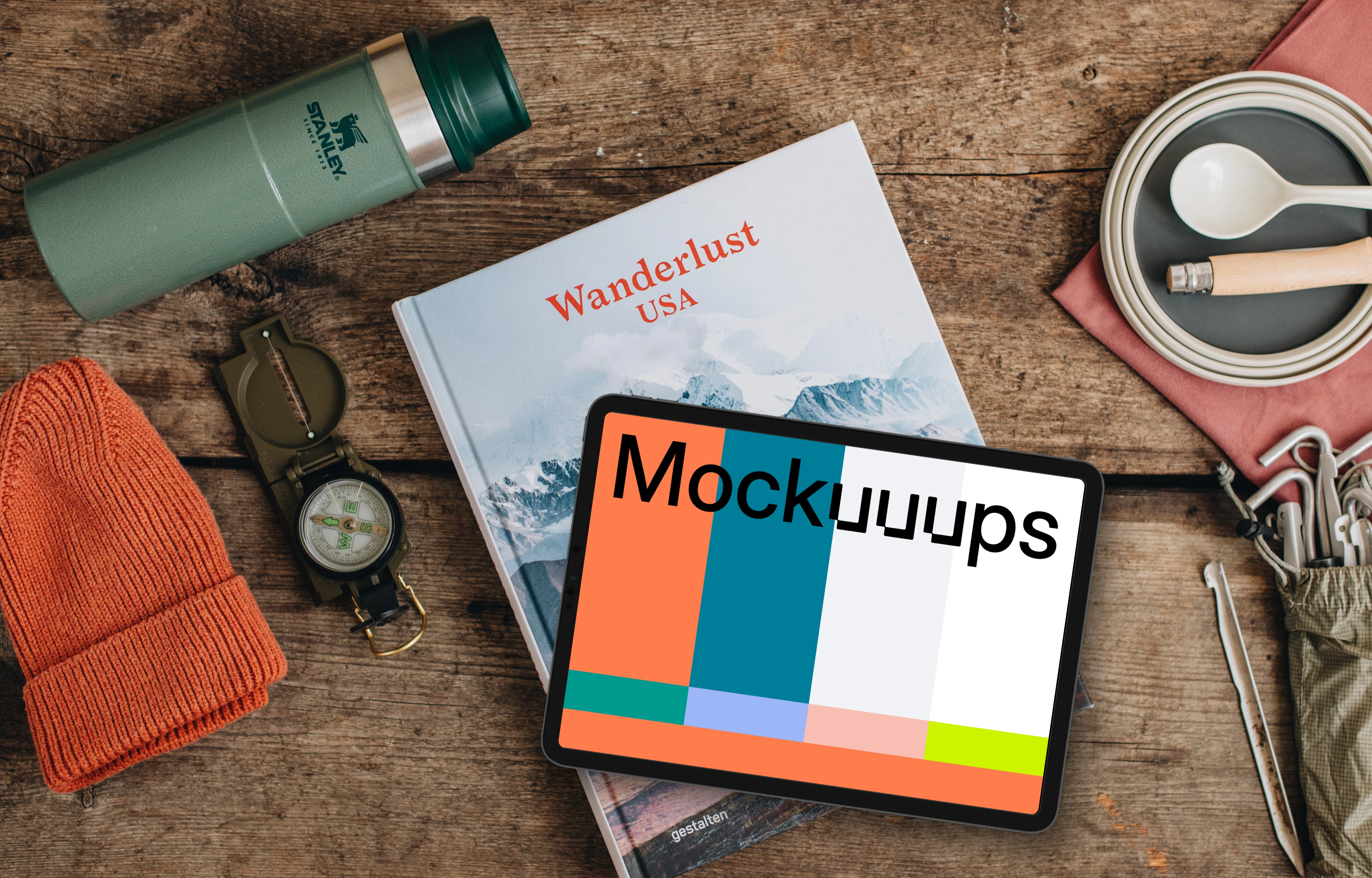 Tablet mockup with hiking supplies