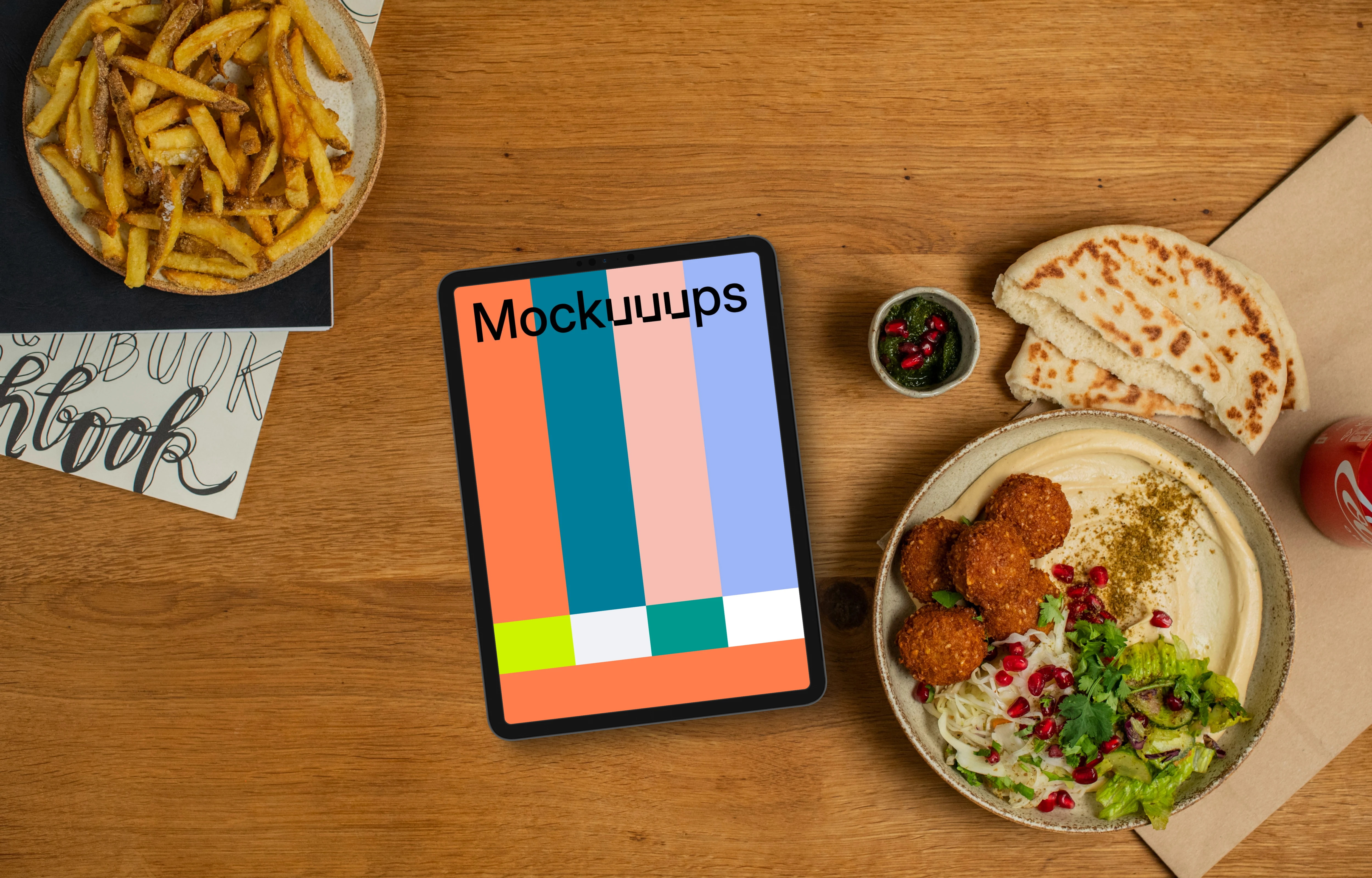 Tablet mockup with hummus and falafel