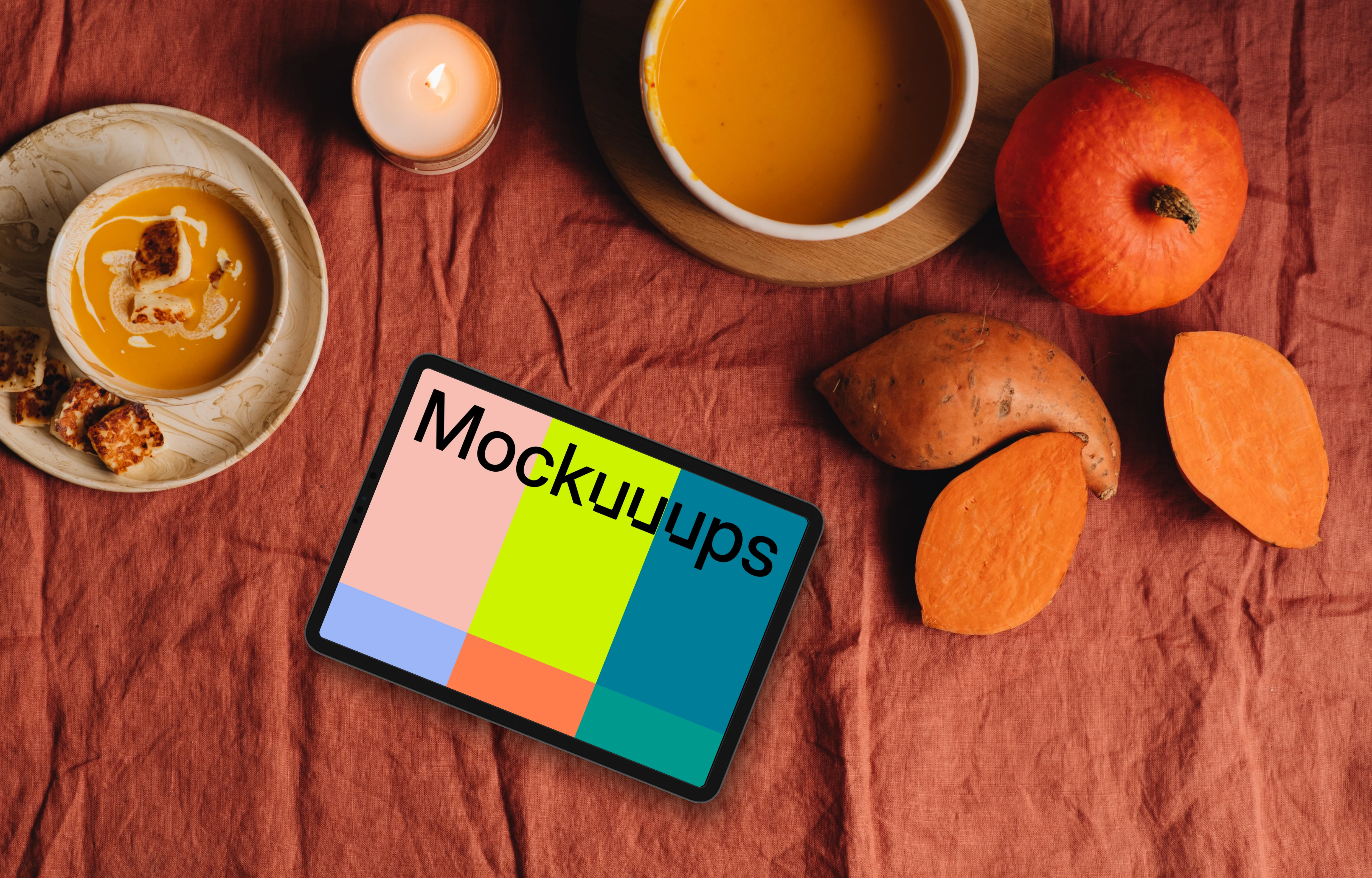 Top view of landscape tablet mockup next to pumpkins