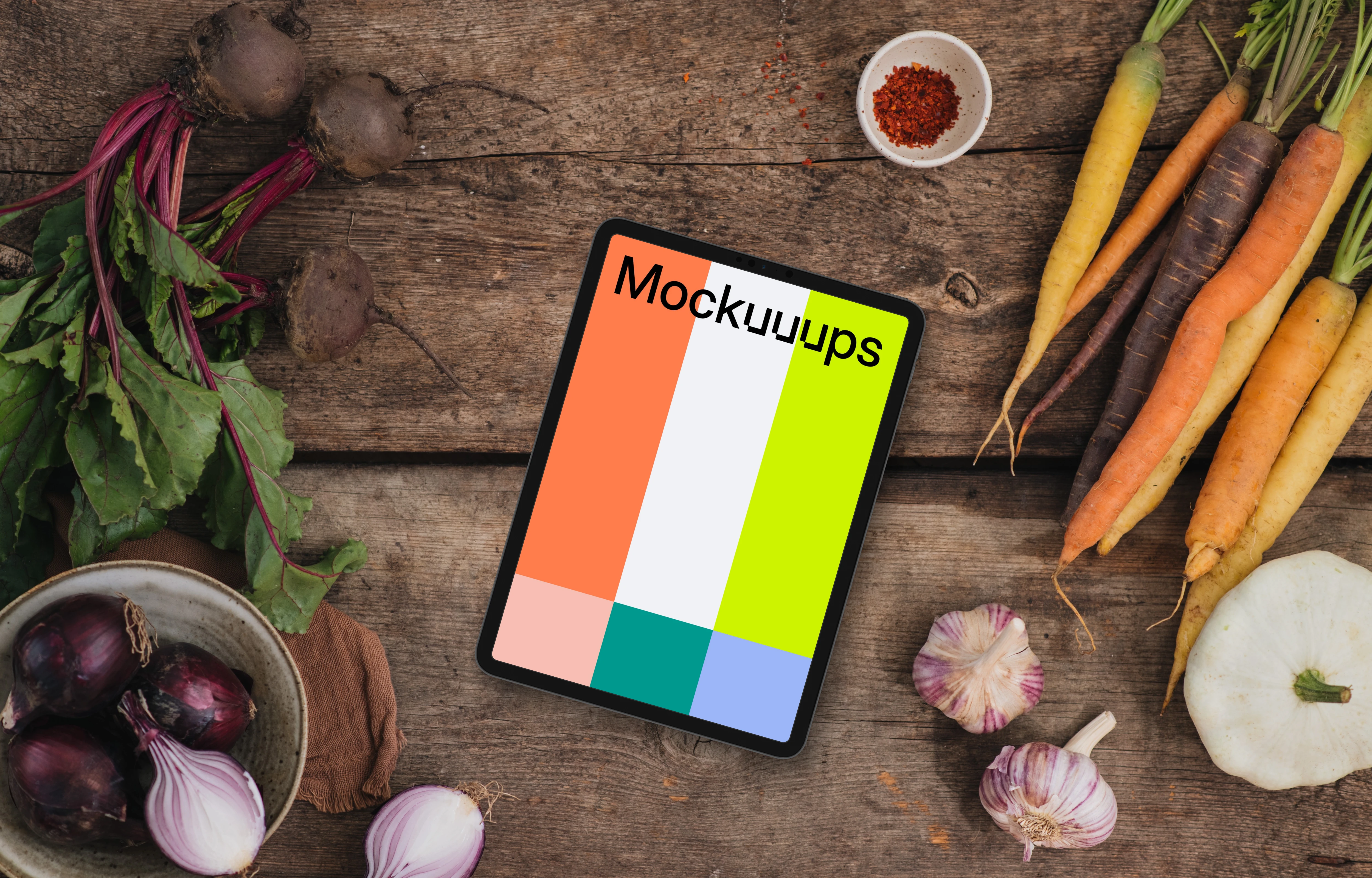 Top view of tablet mockup on wooden desk