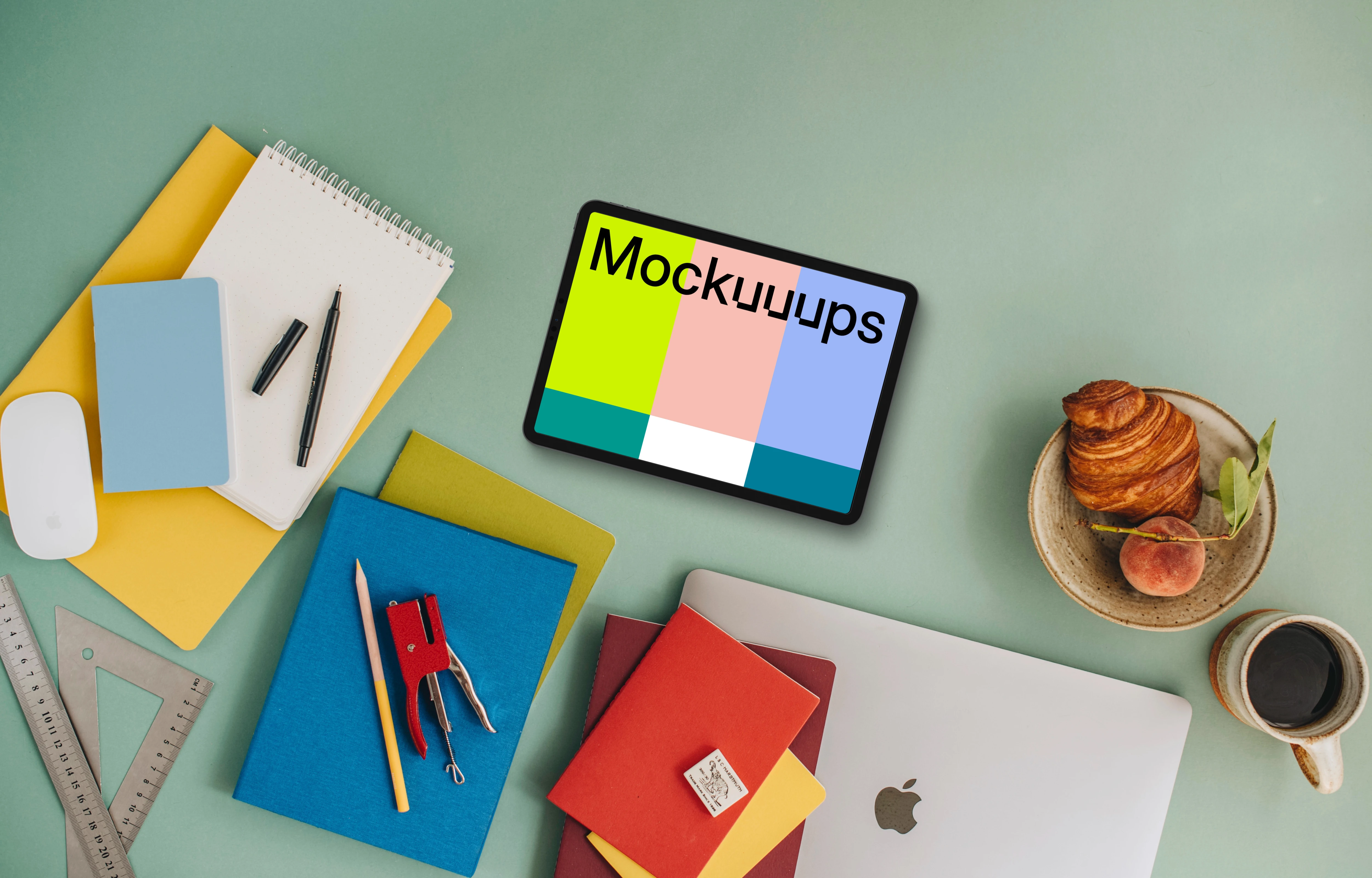 Top view of tablet mockup with school elements around