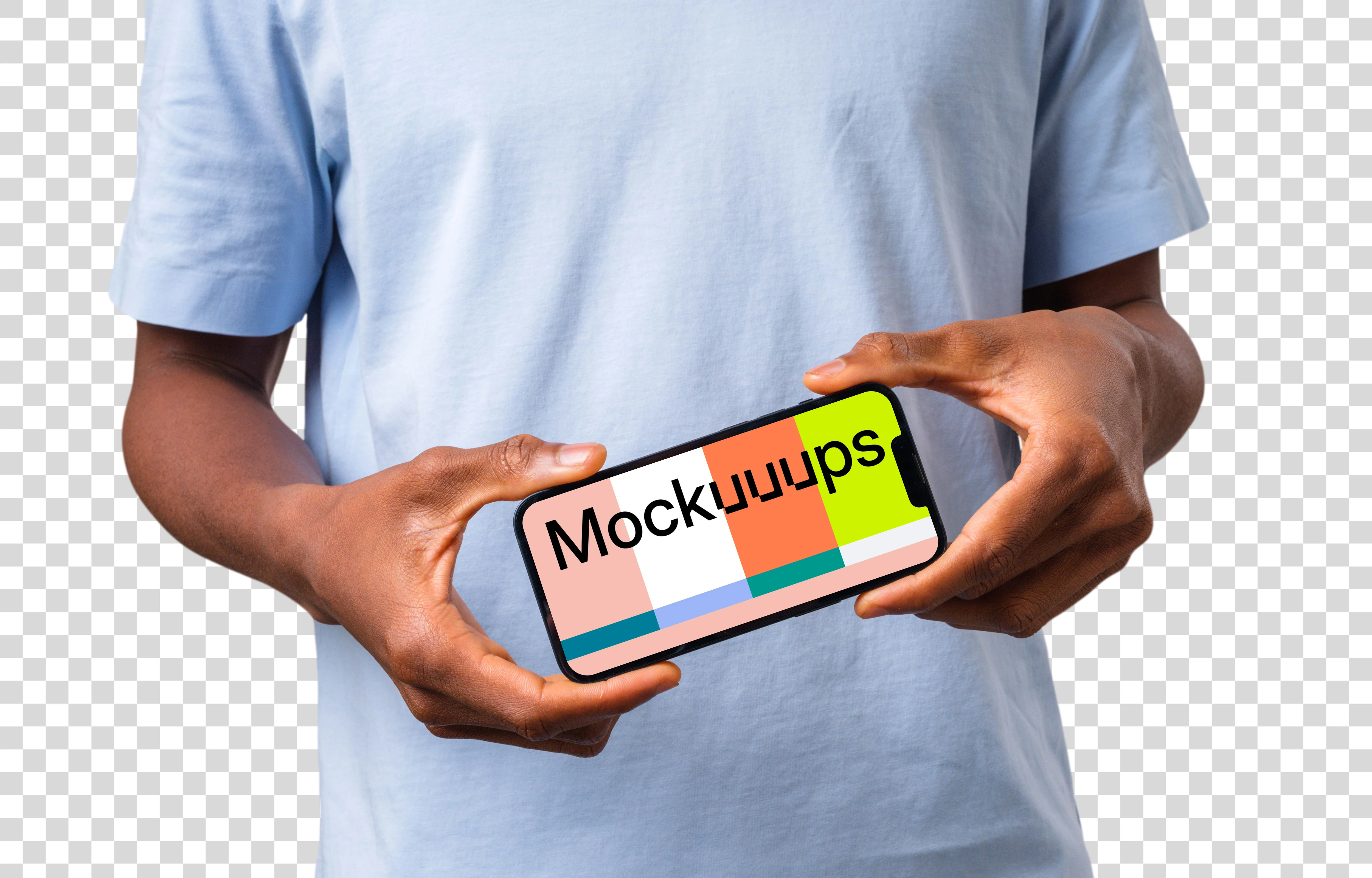 Mockup of a landscape iPhone held by man in light shirt