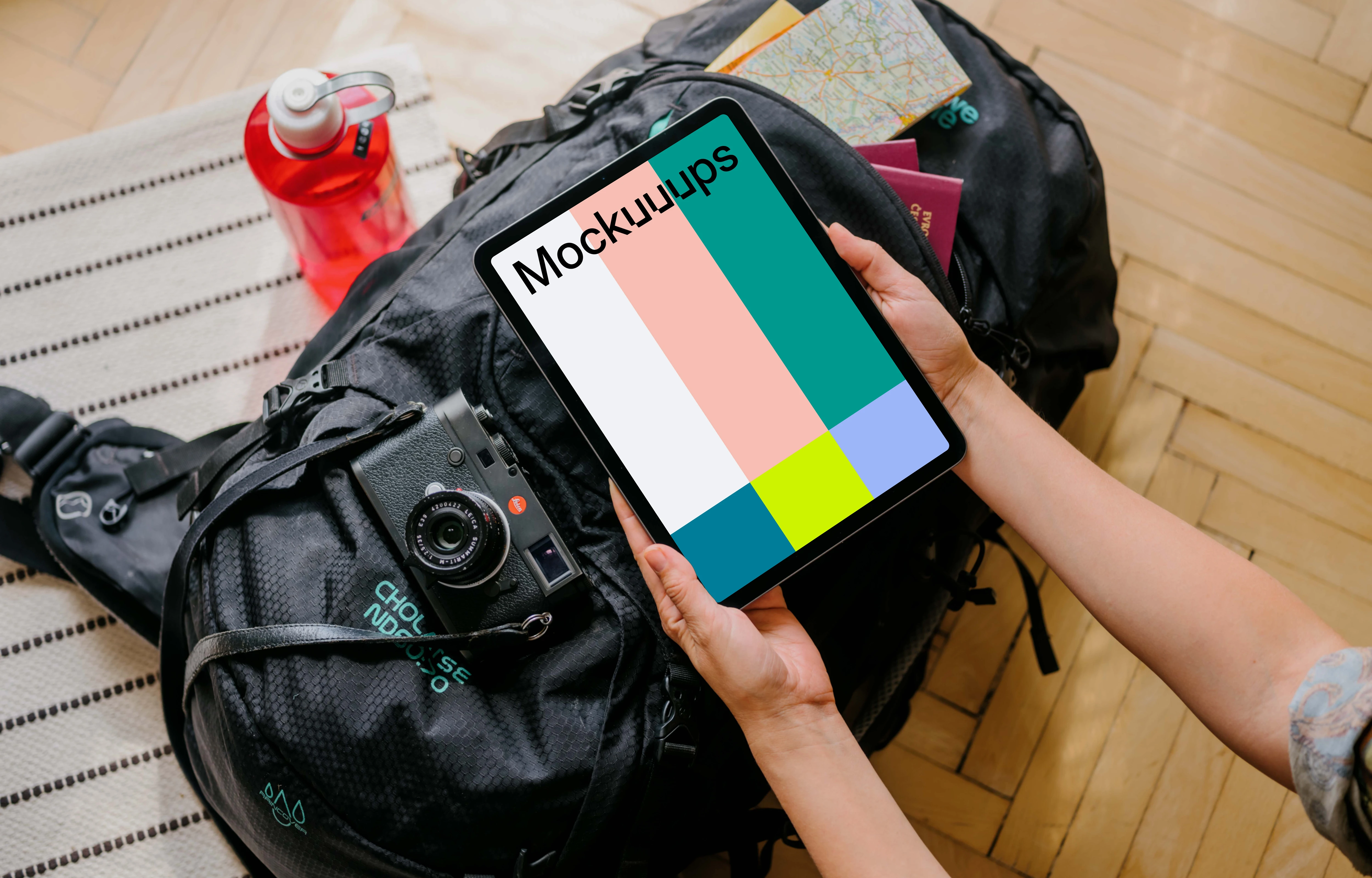 User holding a laptop mockup