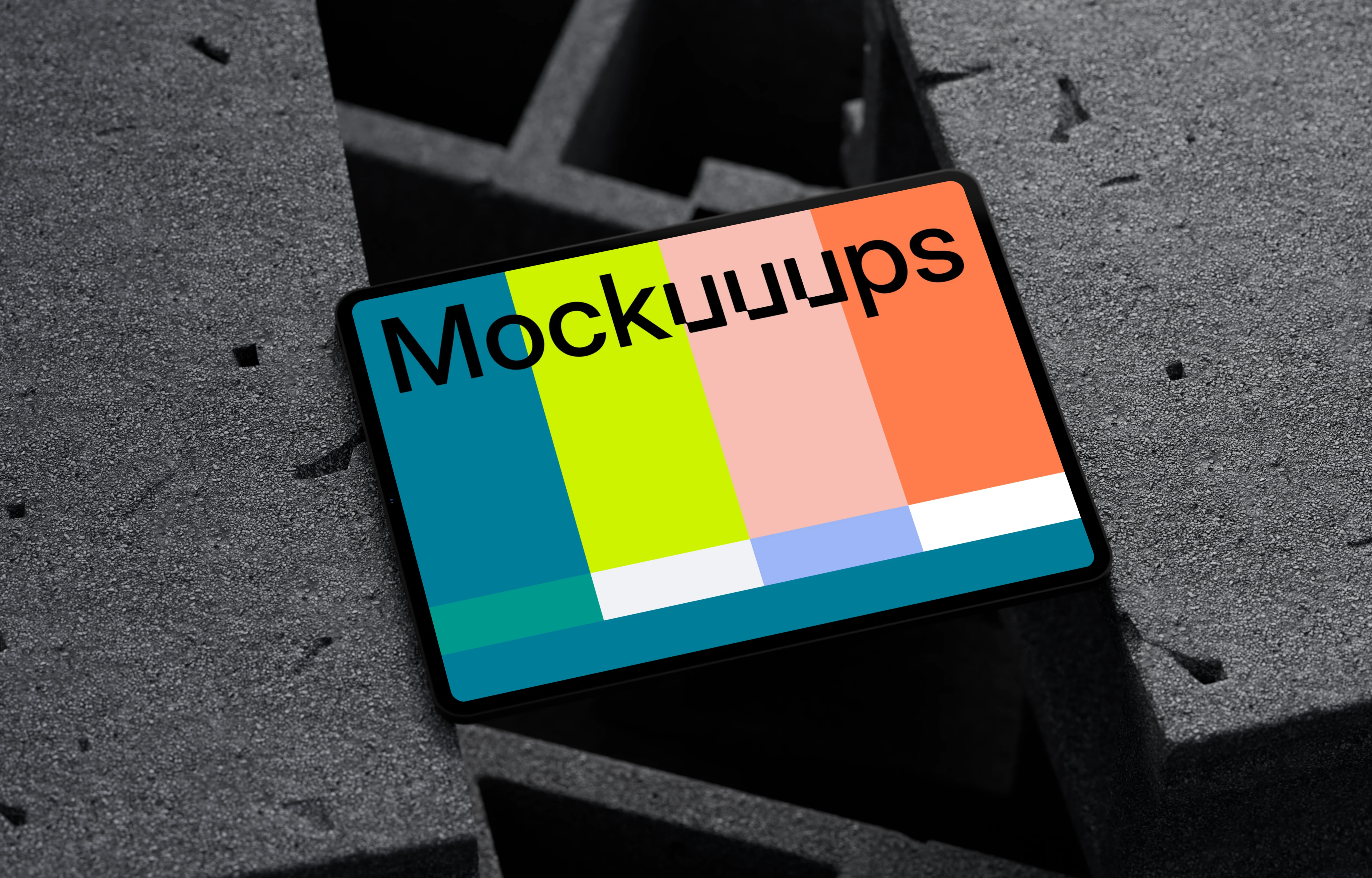 iPad Pro mockup on textured concrete blocks