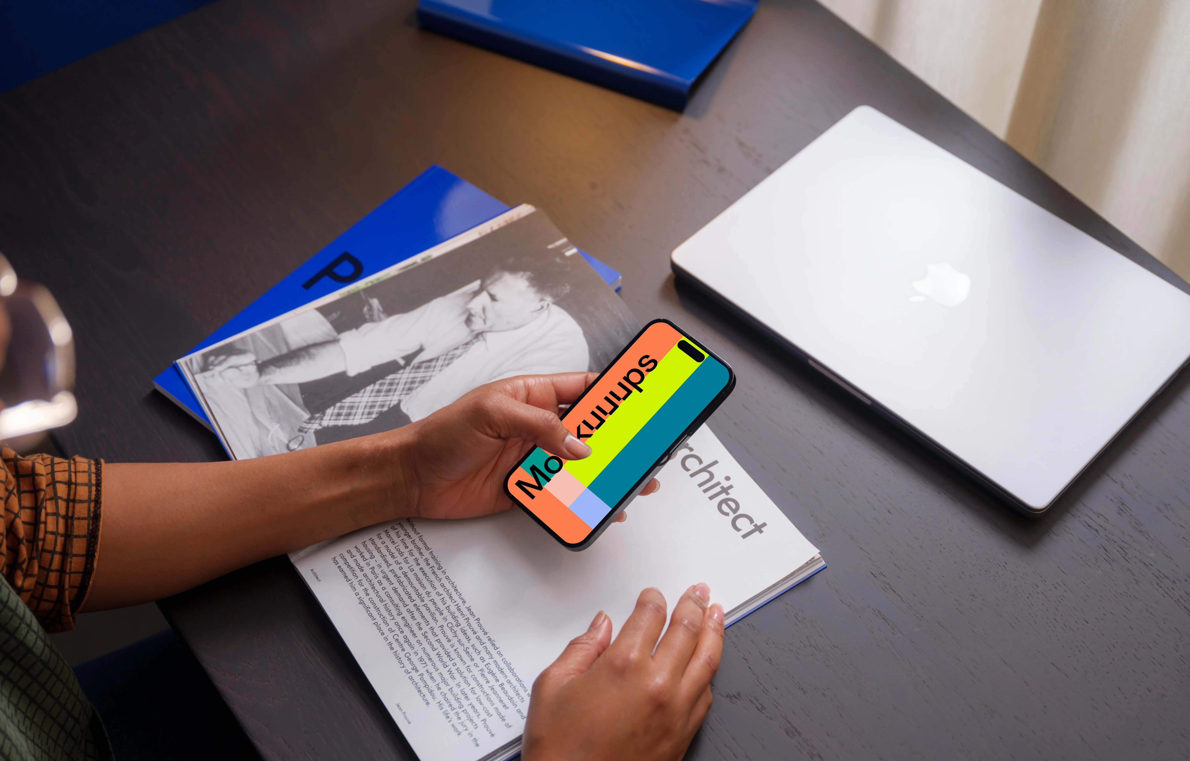 Person typing on a iPhone 14 Pro mockup