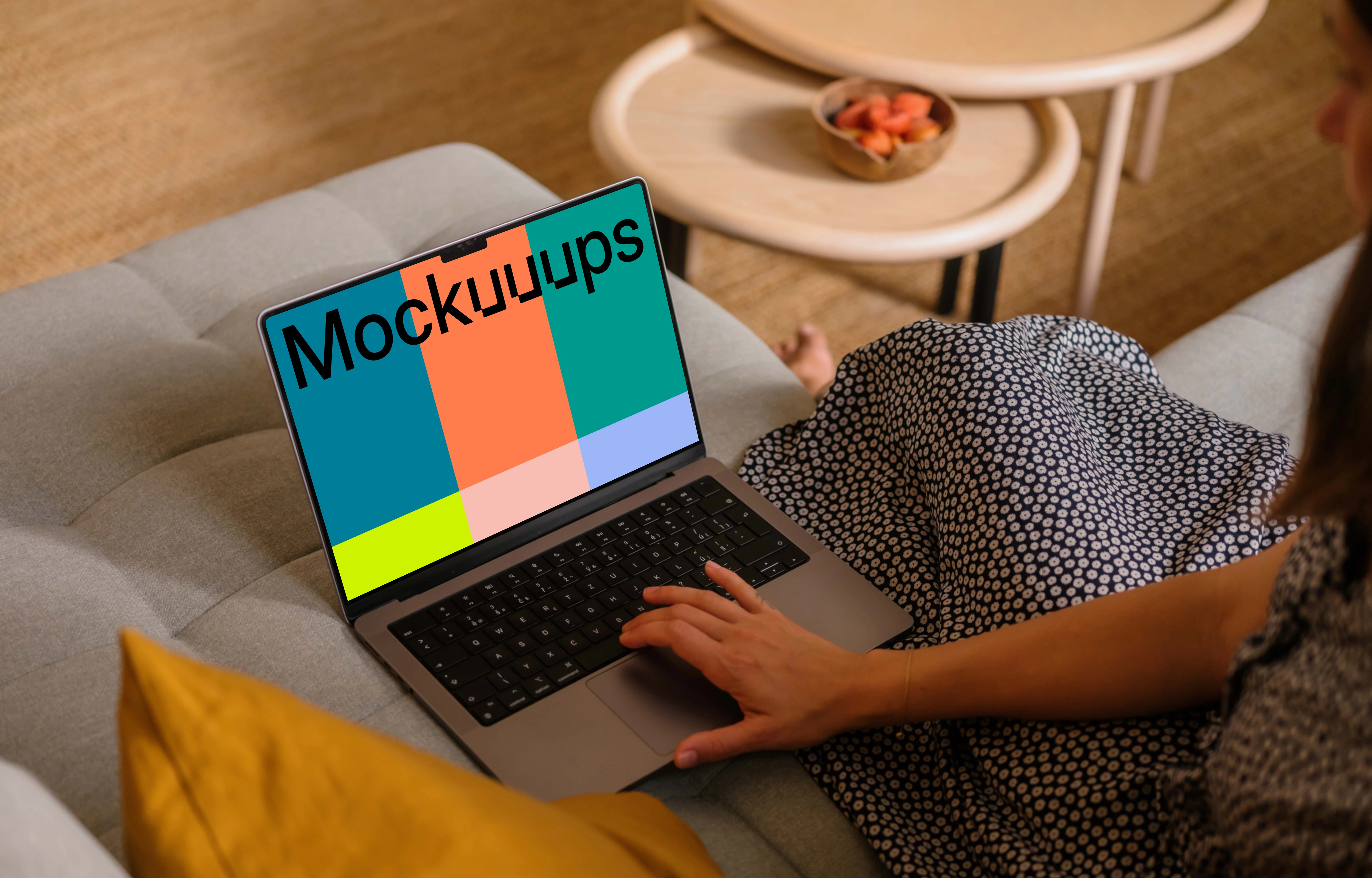 Woman hand scrolling on MacBook Pro mockup
