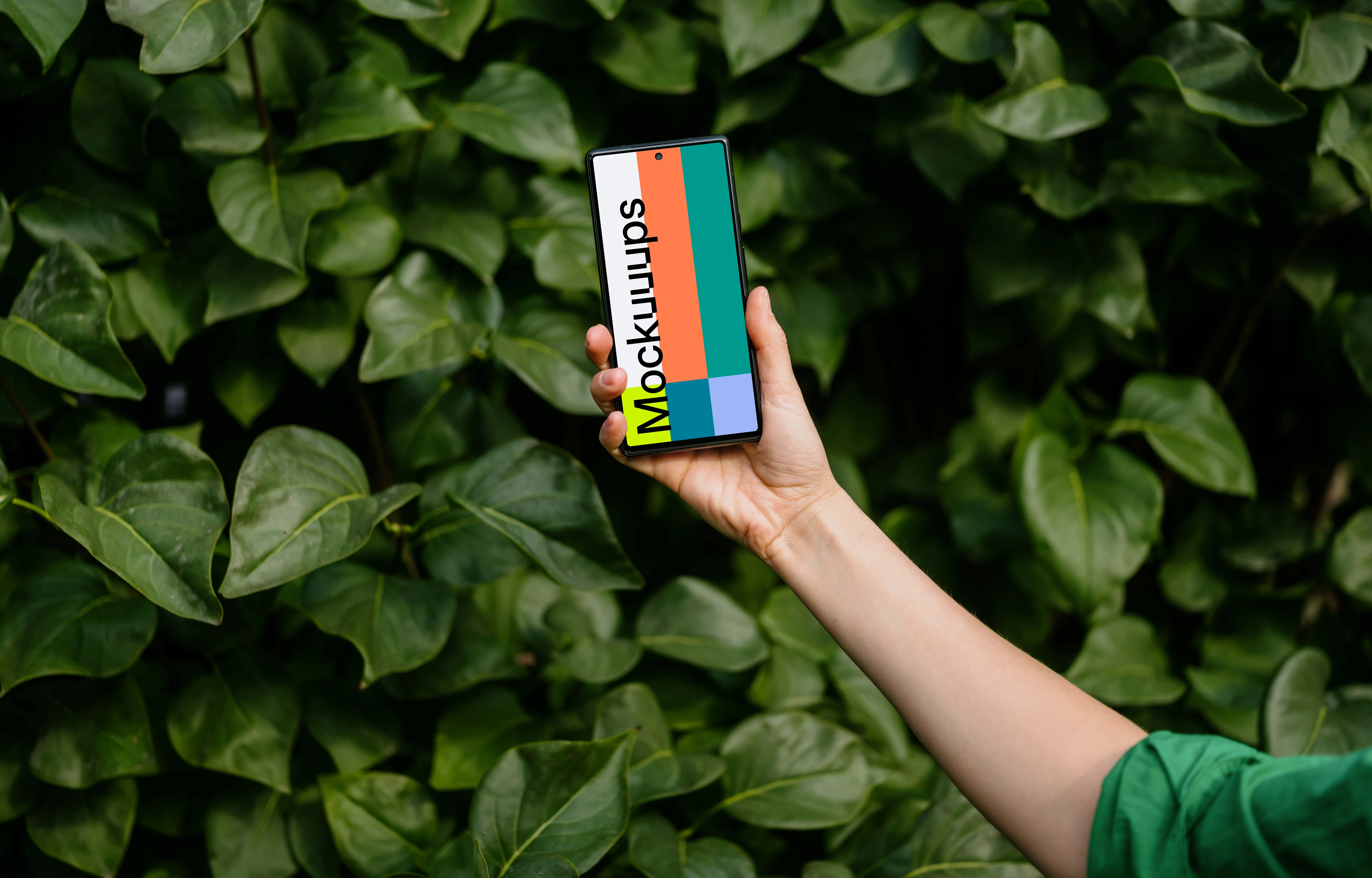 Woman holding a Google Pixel 6 mockup in green theme