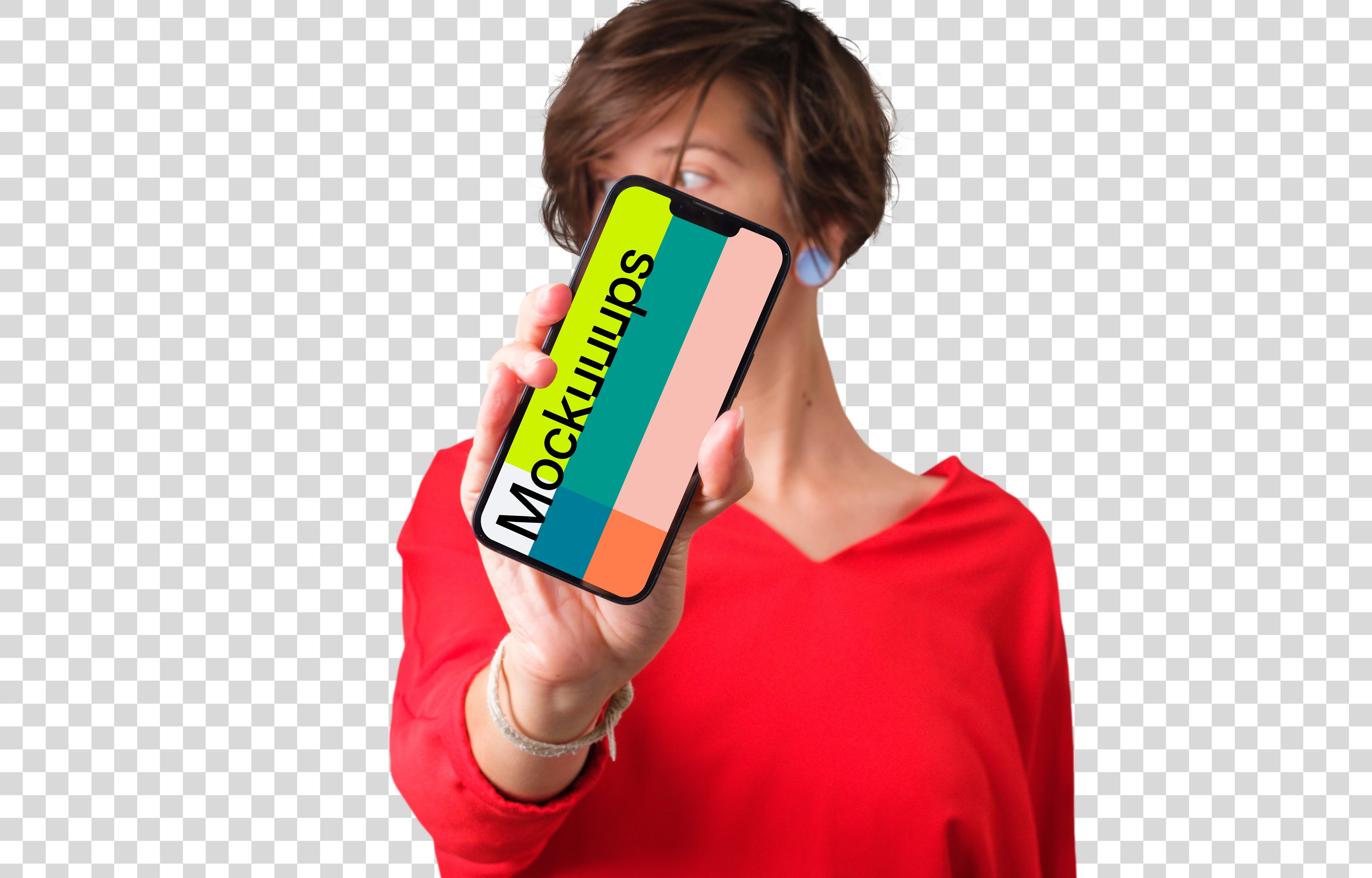 Woman in red shirt holding iPhone mockup in front of her face