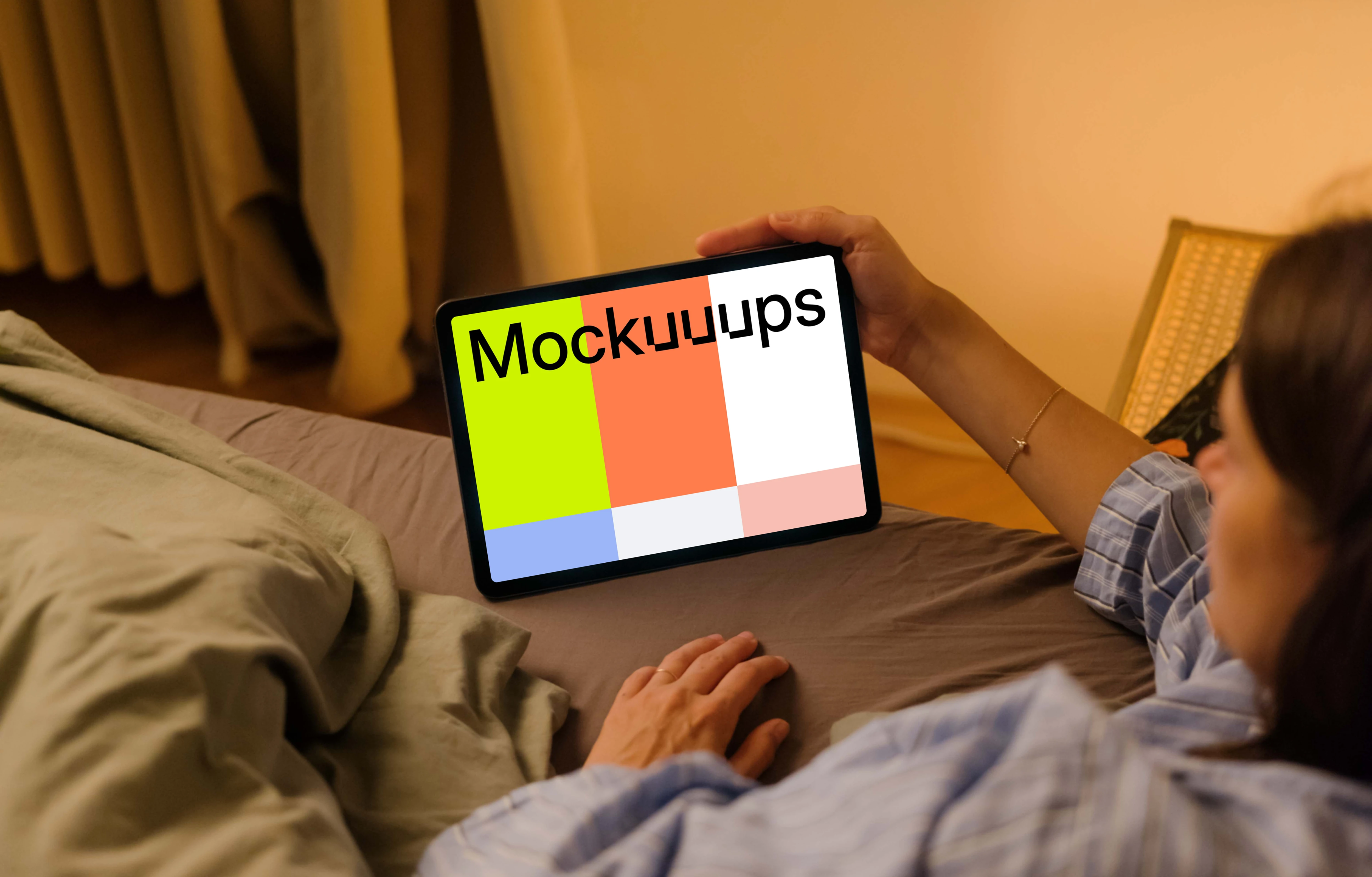 Woman watching on an iPad Air mockup