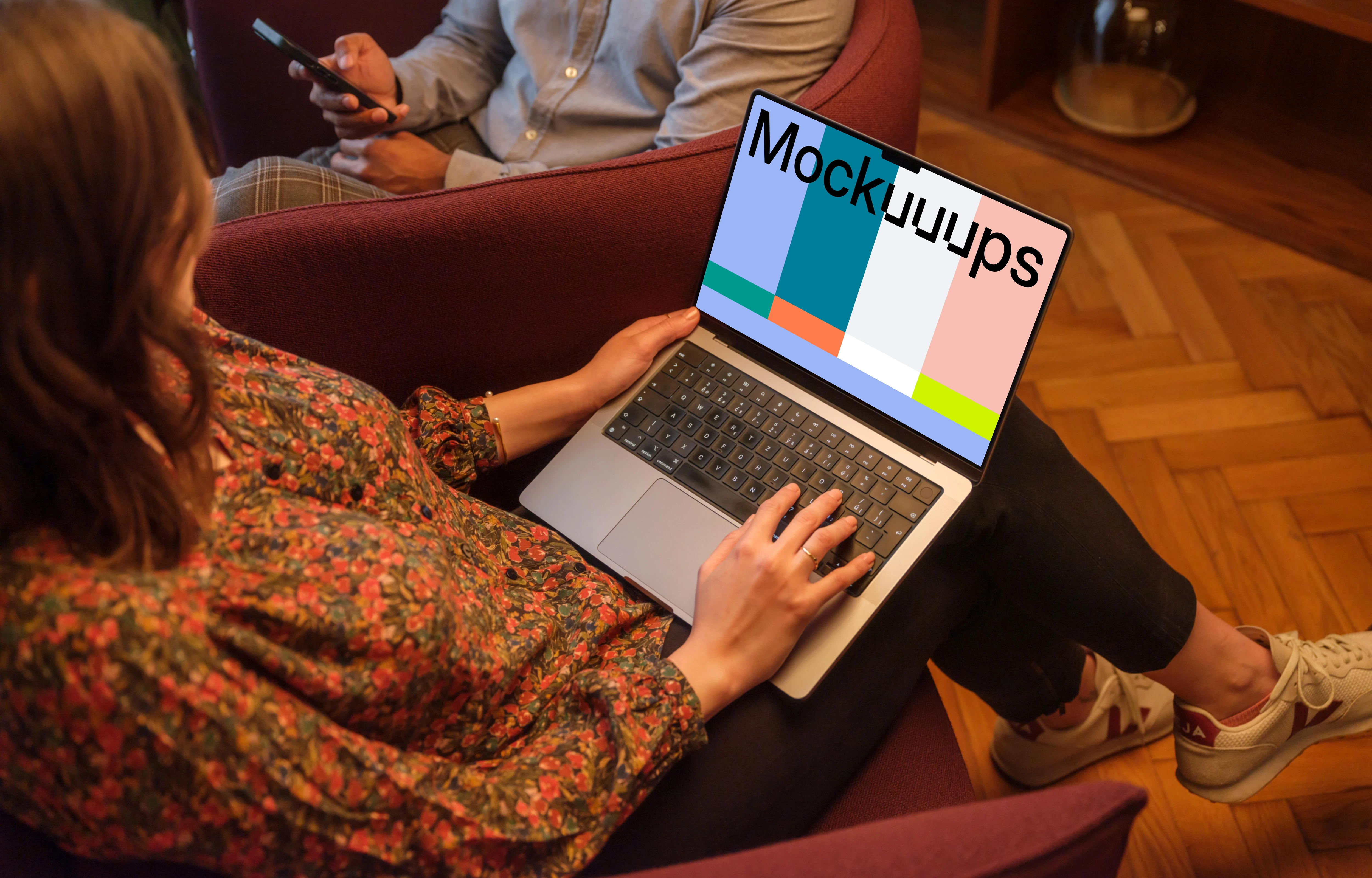 Woman working on a MacBook Pro 14 mockup in the office