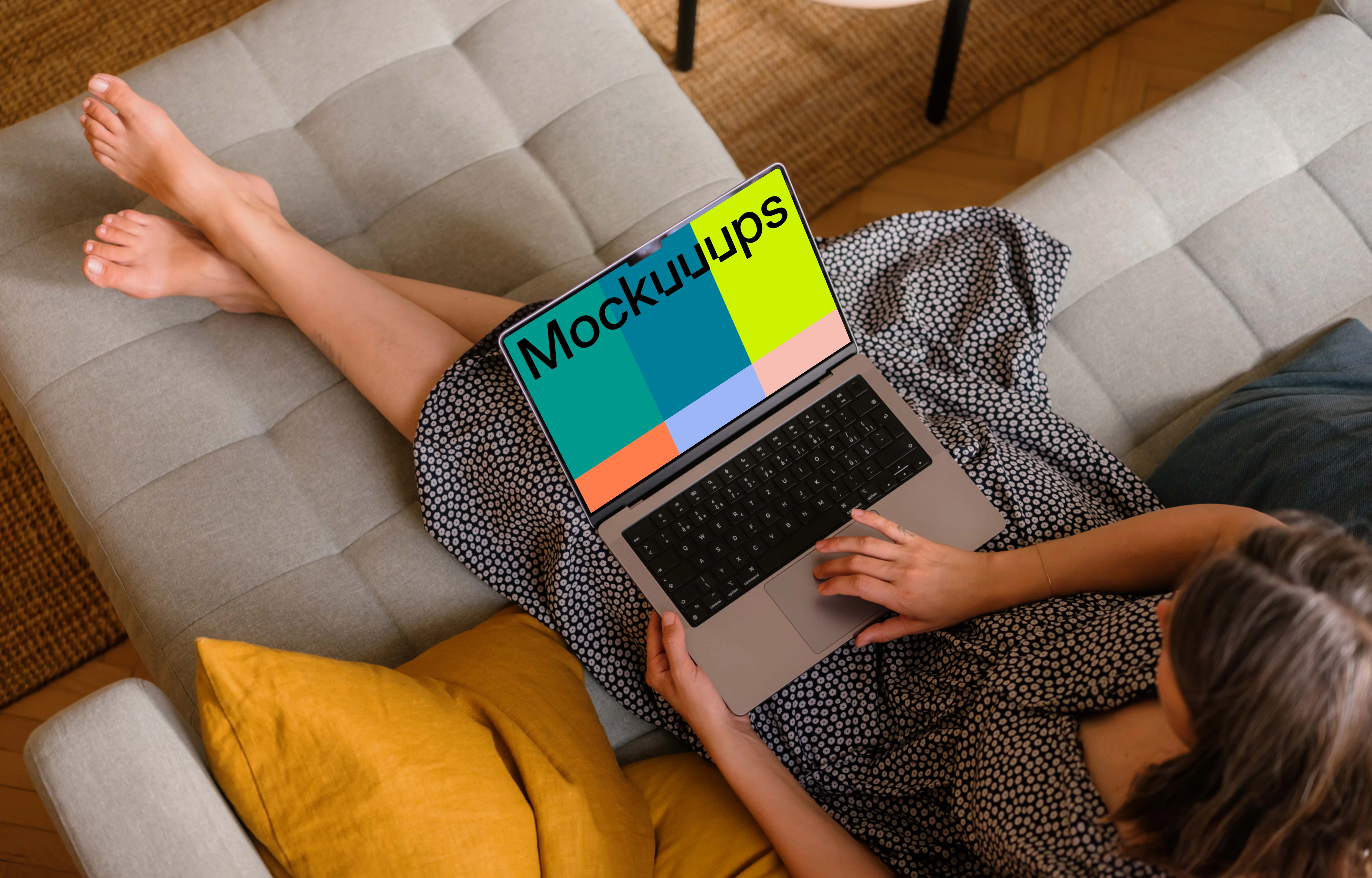 Woman working on a MacBook pro 14 mockup