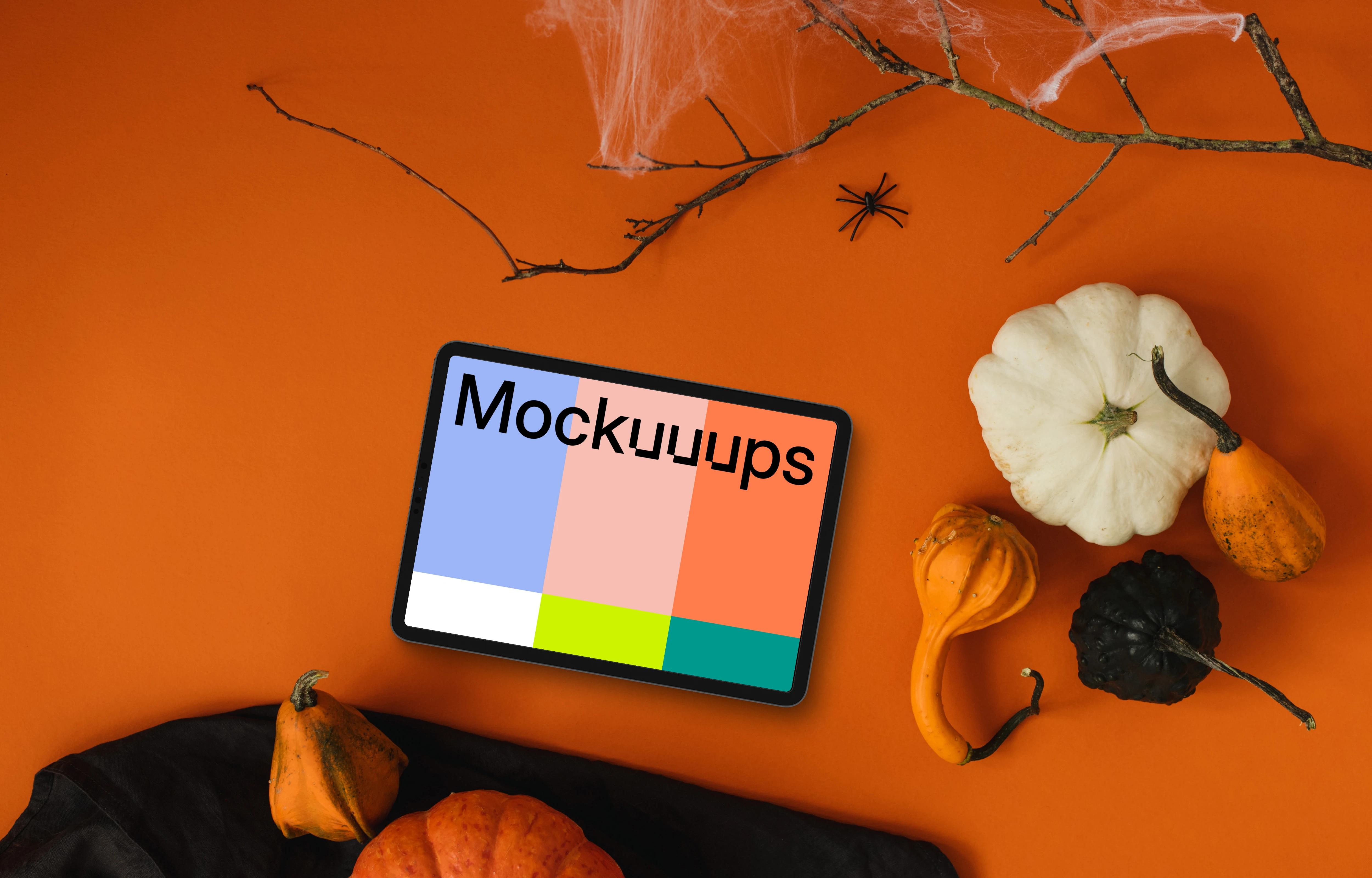 Top view of landscape tablet mockup with halloween decorations