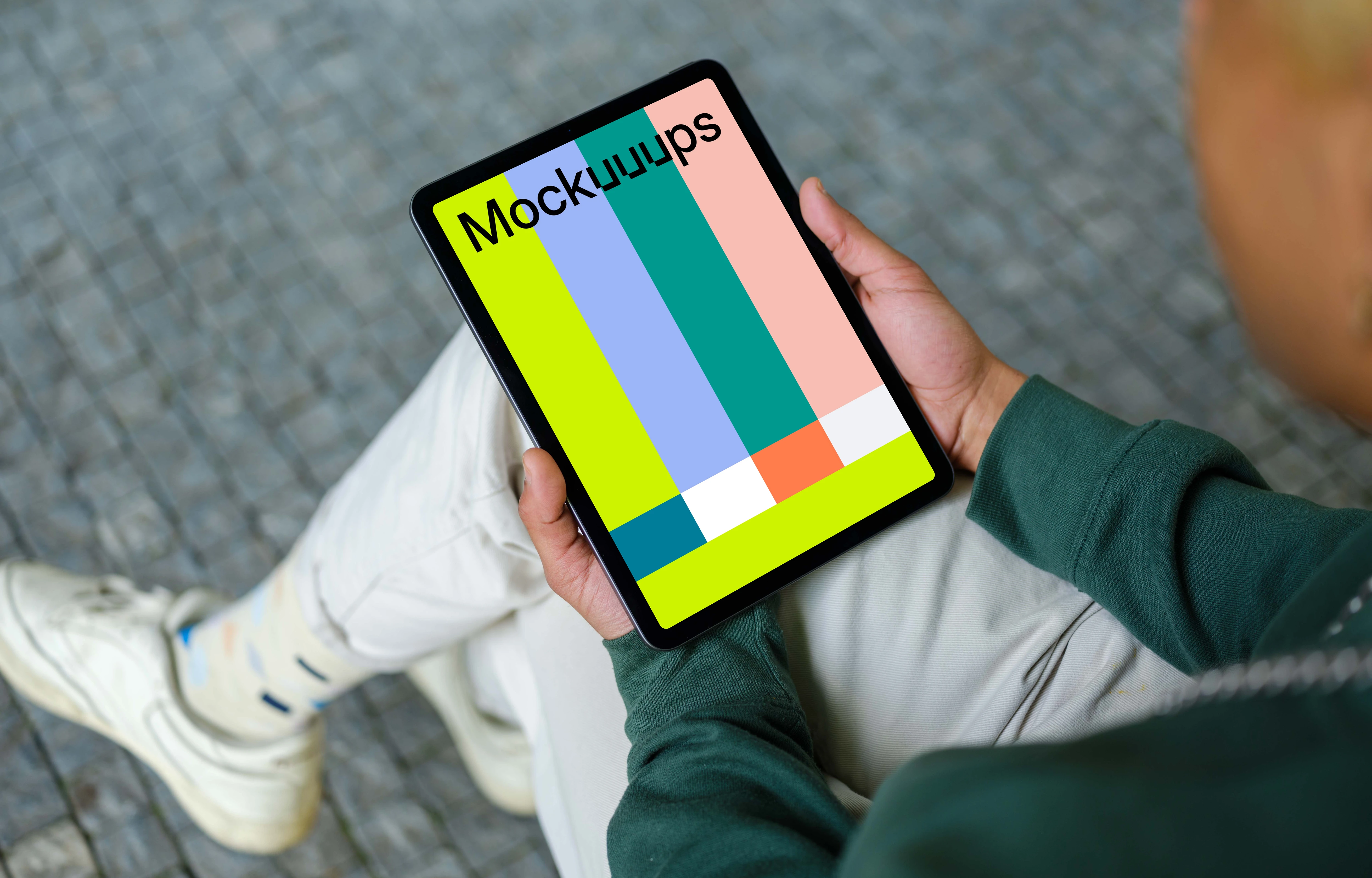 Young man reading on tablet mockup