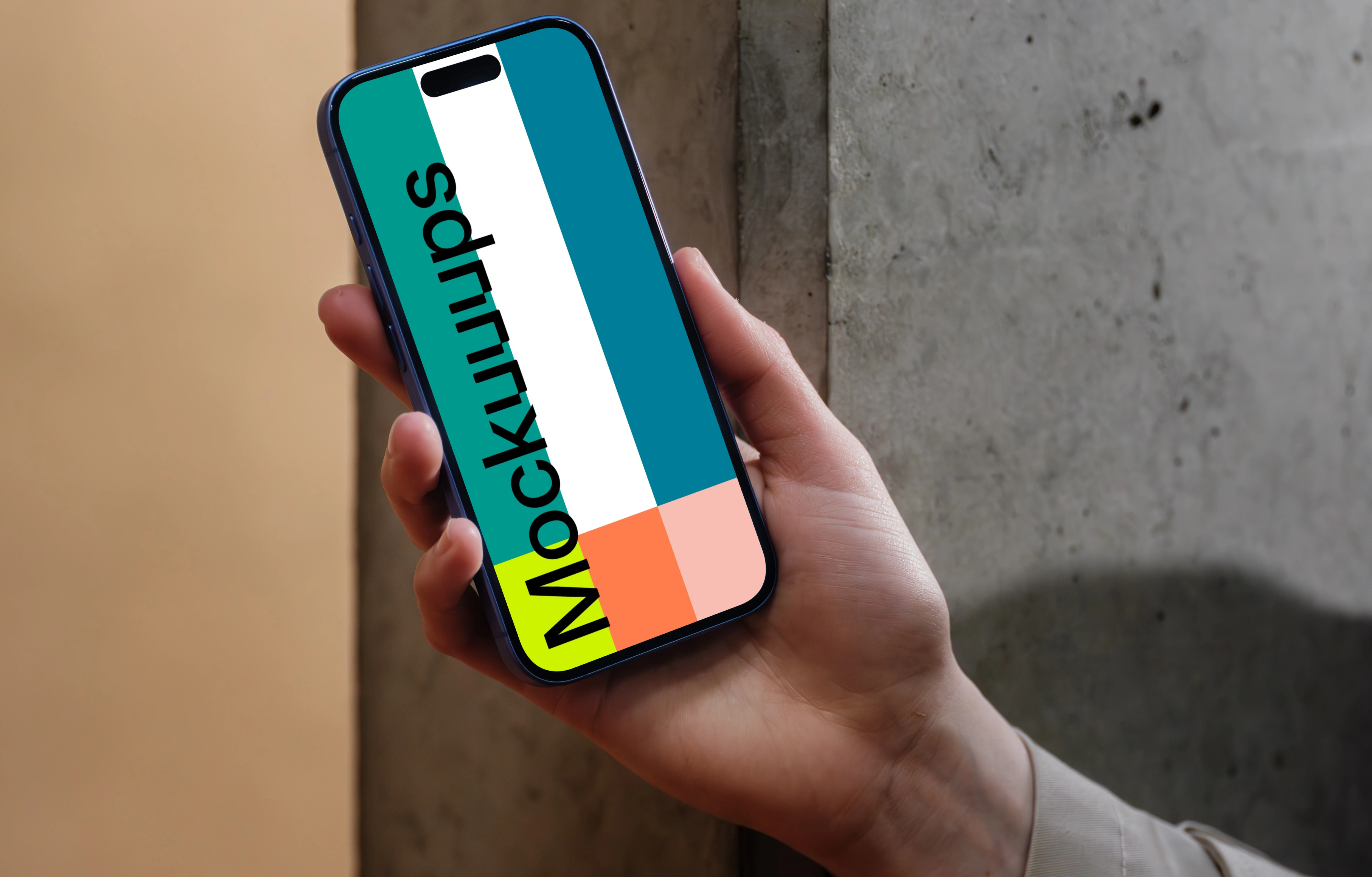 iPhone 16 mockup held against a concrete wall
