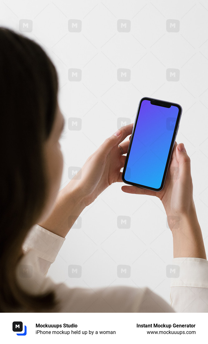 iPhone mockup held up by a woman