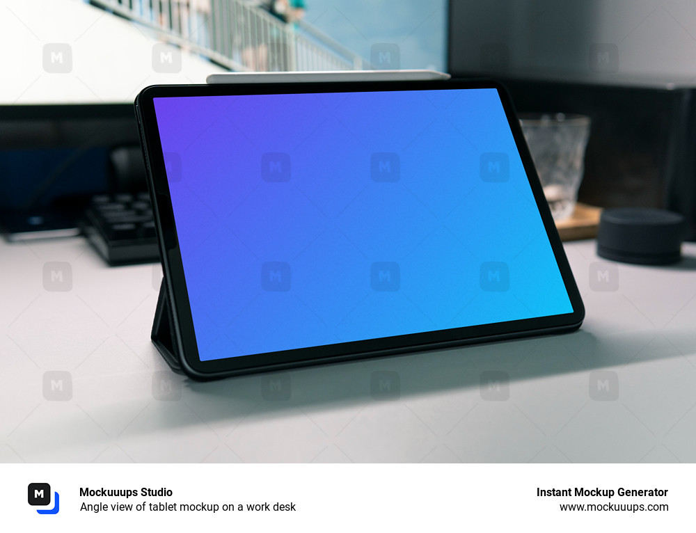 Angle view of tablet mockup on a work desk