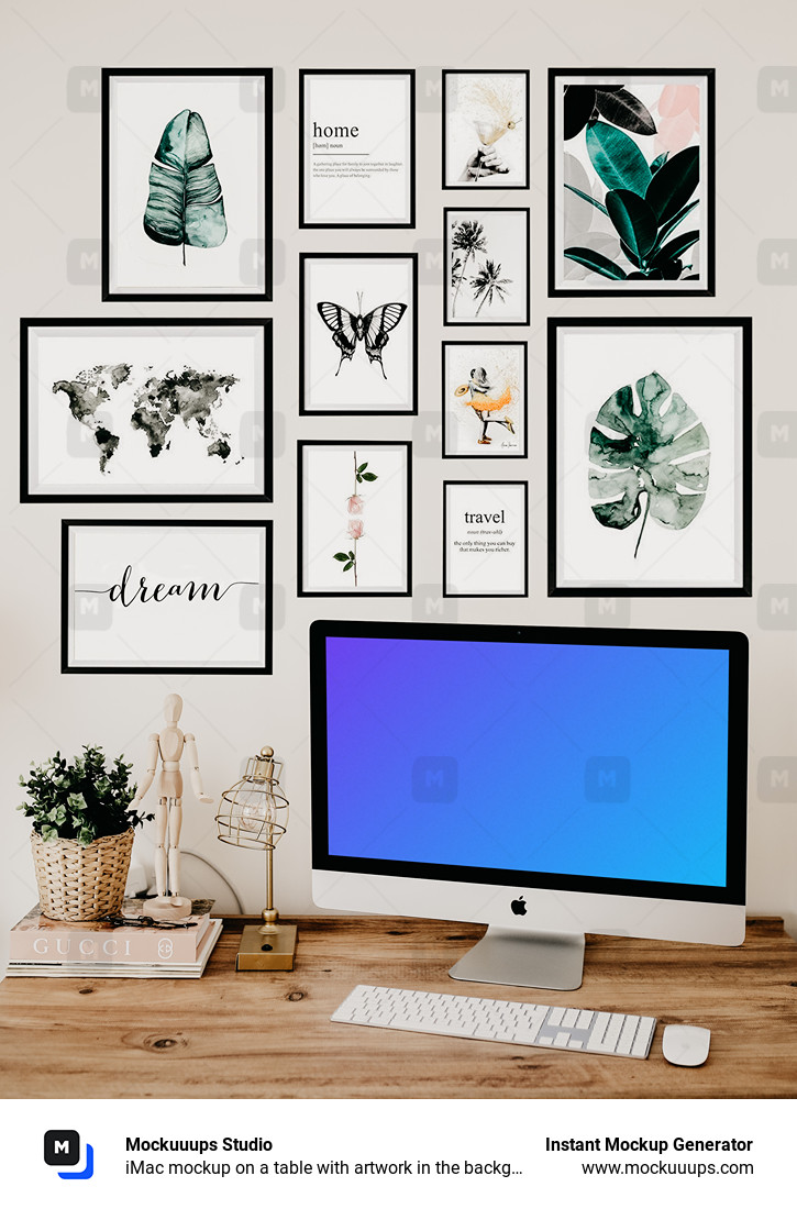  iMac mockup on a table with artwork in the background