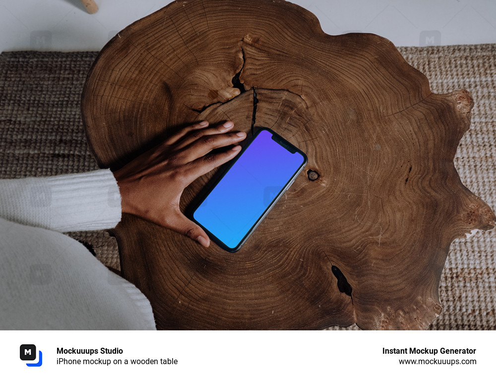 iPhone mockup on a wooden table