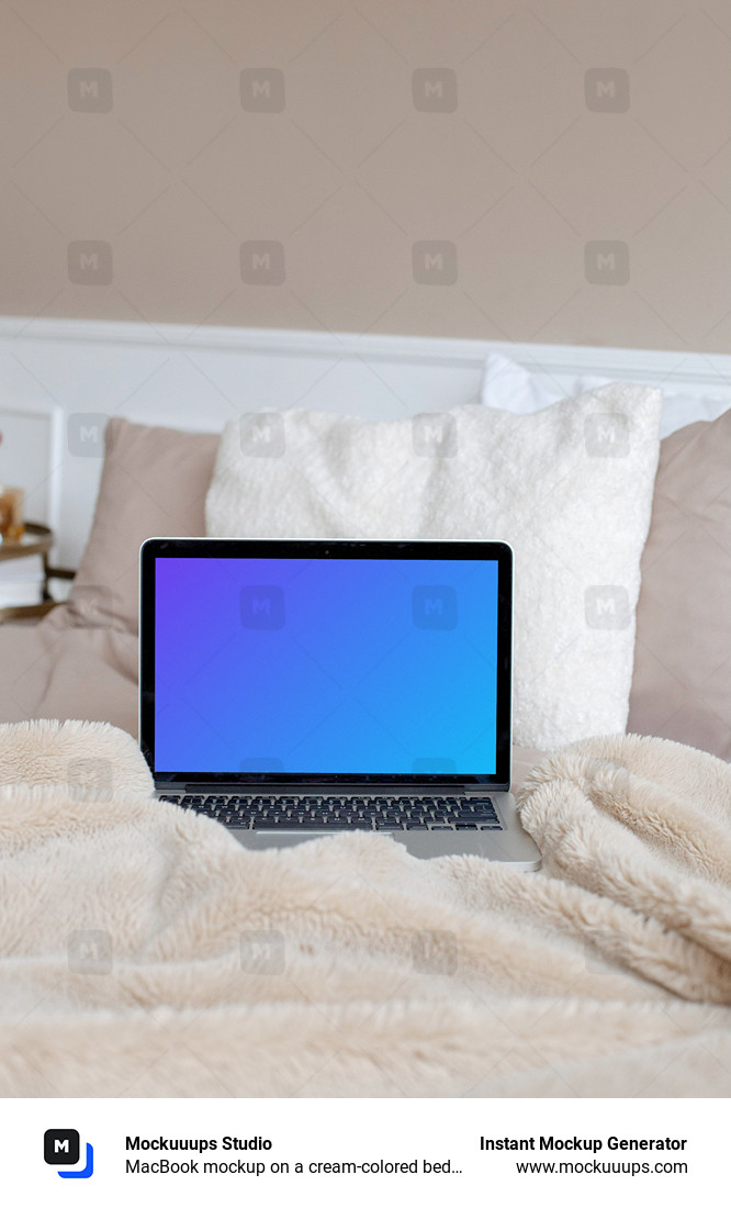 MacBook mockup on a cream-colored bed with white pillows in the background