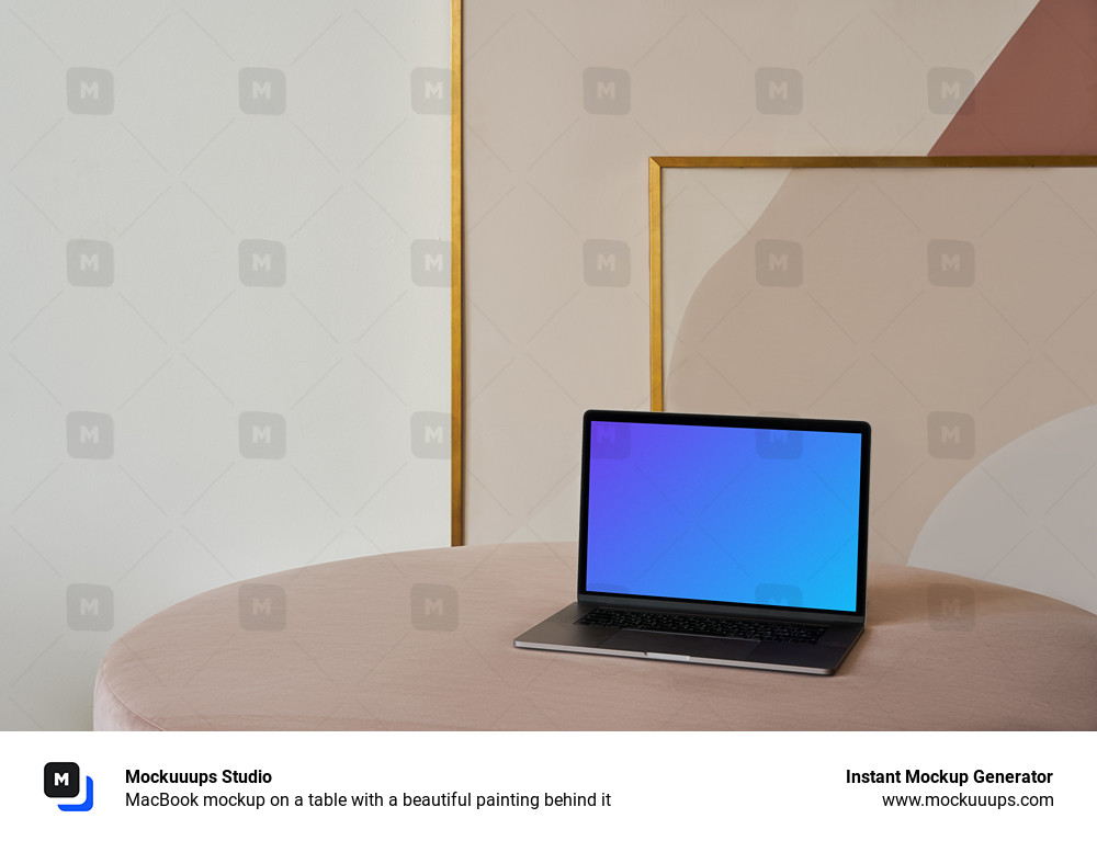 MacBook mockup on a table with a beautiful painting behind it