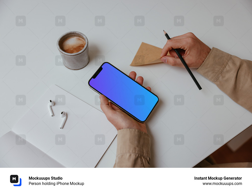 Person holding iPhone Mockup